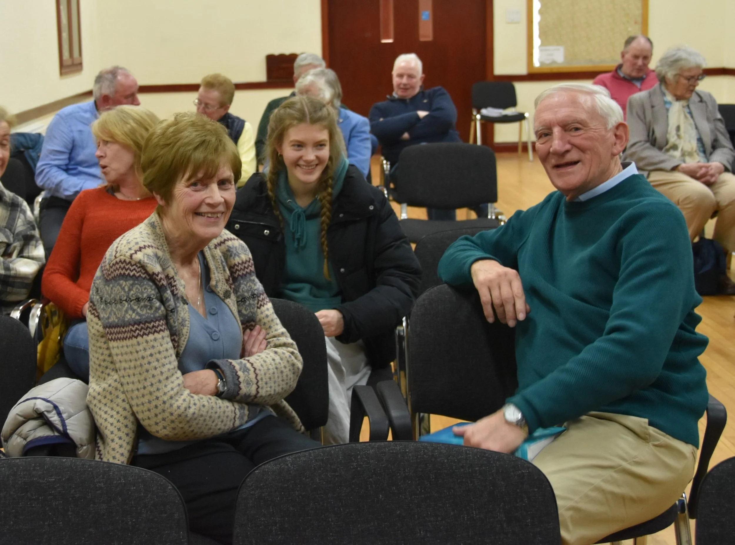 Members of the congregation smiling during a gathering at Ballylaggan RPC