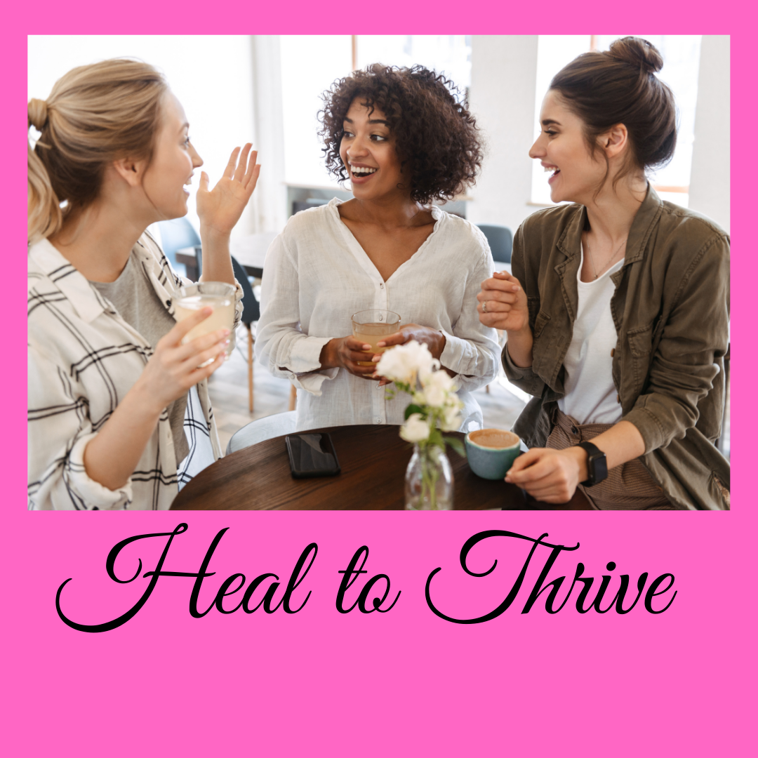 Three women having a friendly conversation at a table, holding cups and glasses, with a pink background and the words "Heal to Thrive" written in cursive.