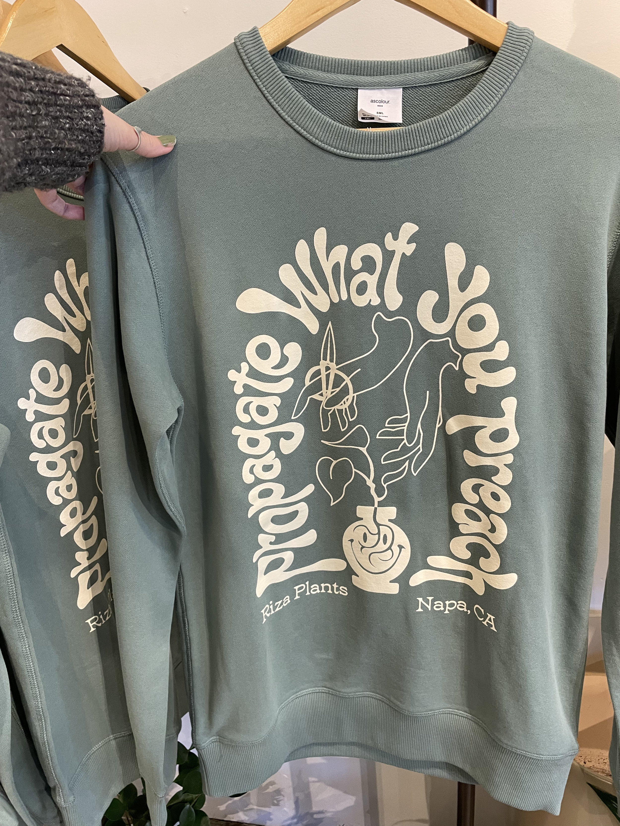 rizas_merch_irl.png