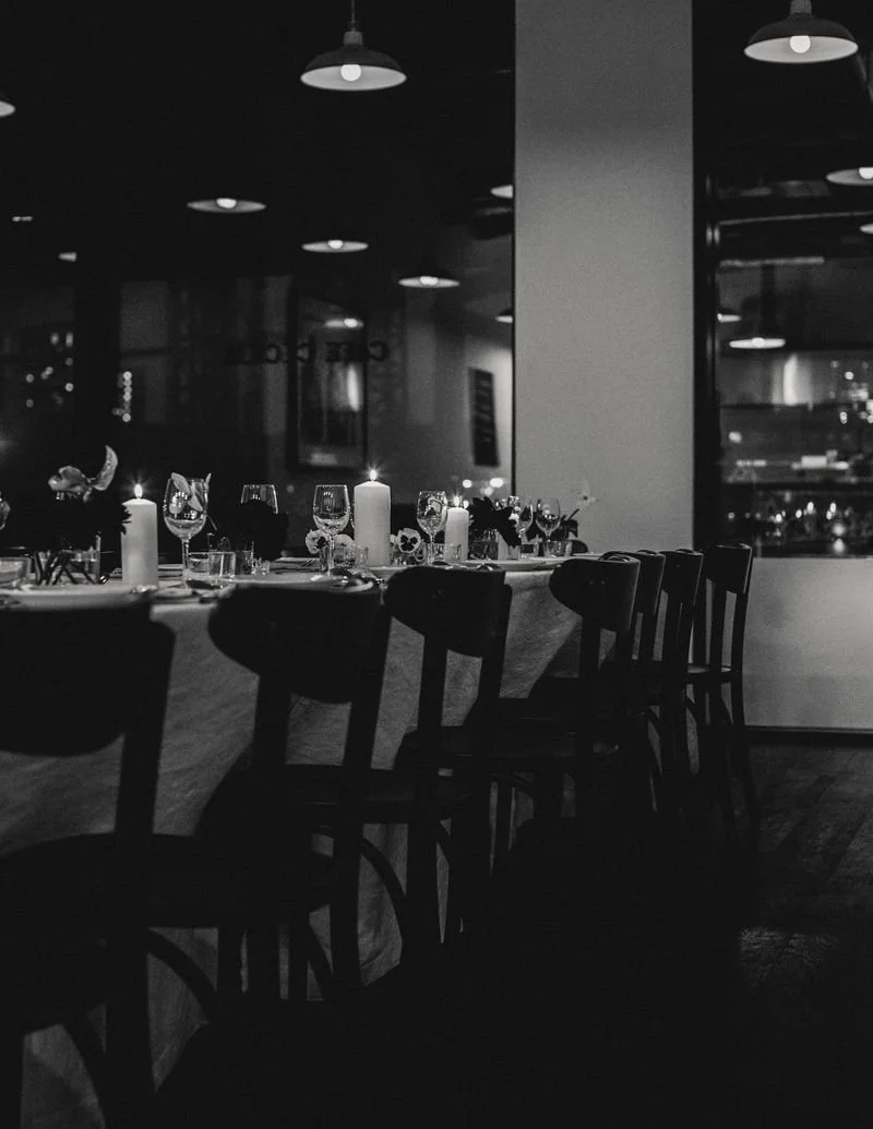 Elegant restaurant setting with candlelit dining table