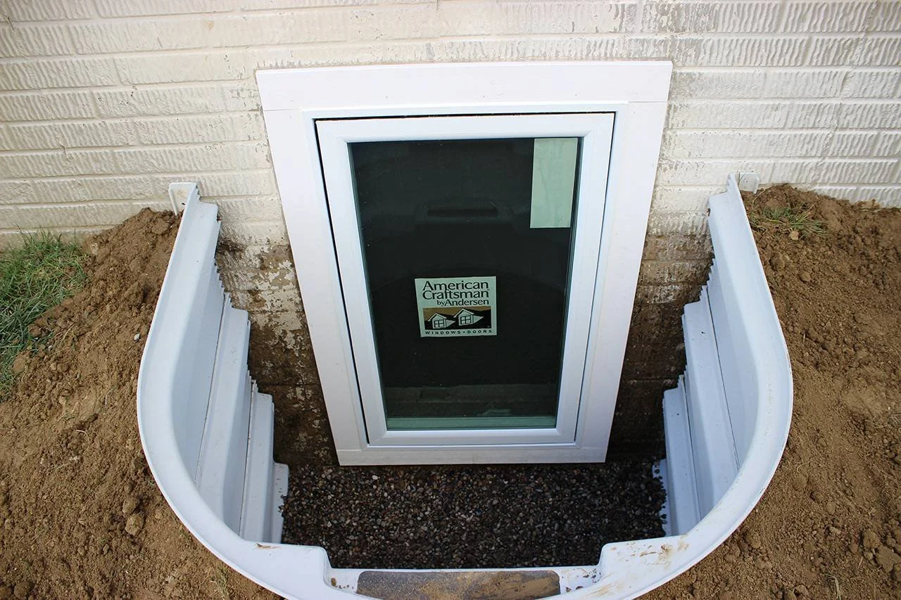 Newly installed egress window providing safety and natural light in Urbandale basement
