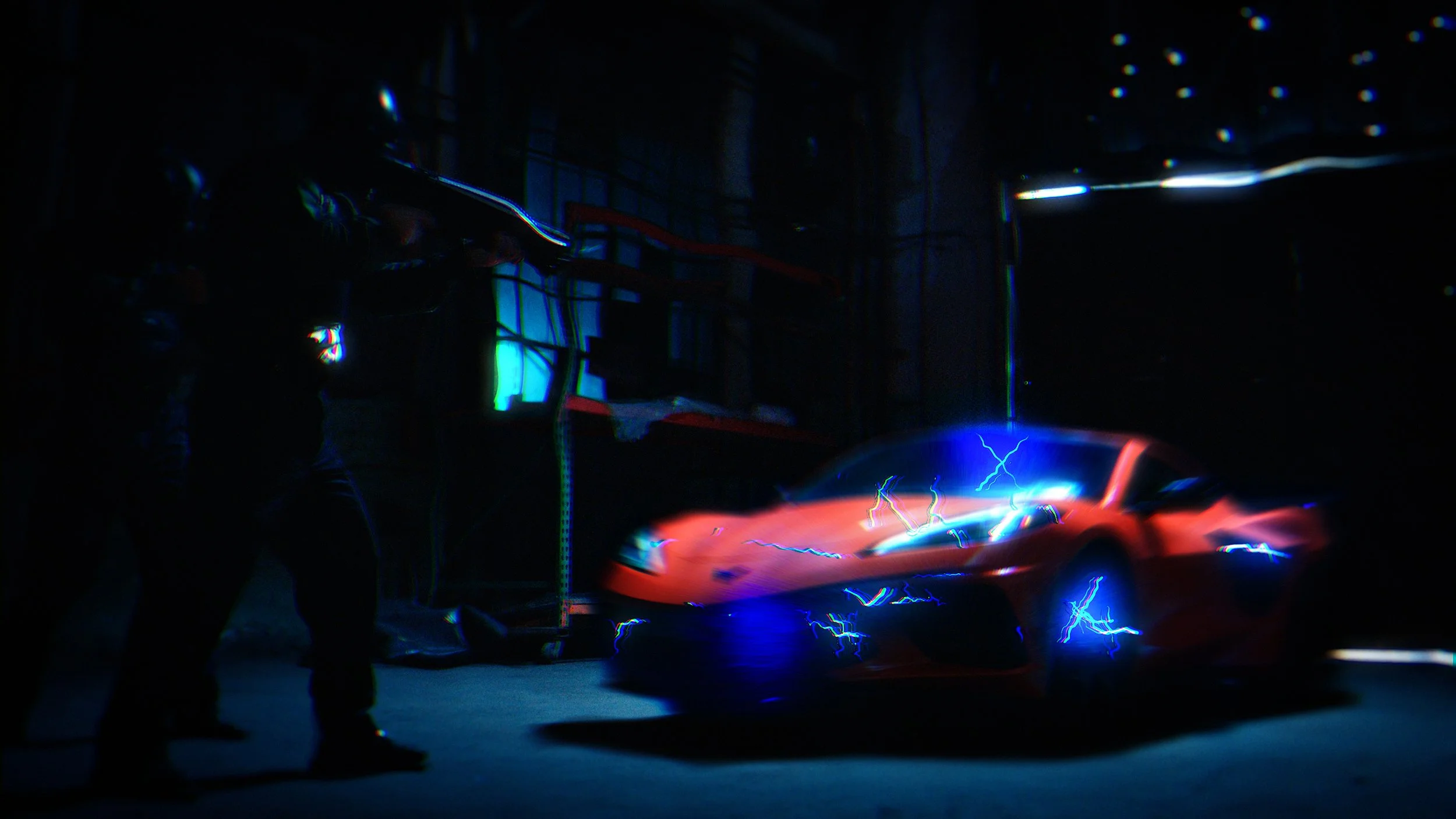 A red sports car in a dark garage with blue and white electrical sparks around it, and two people standing nearby.