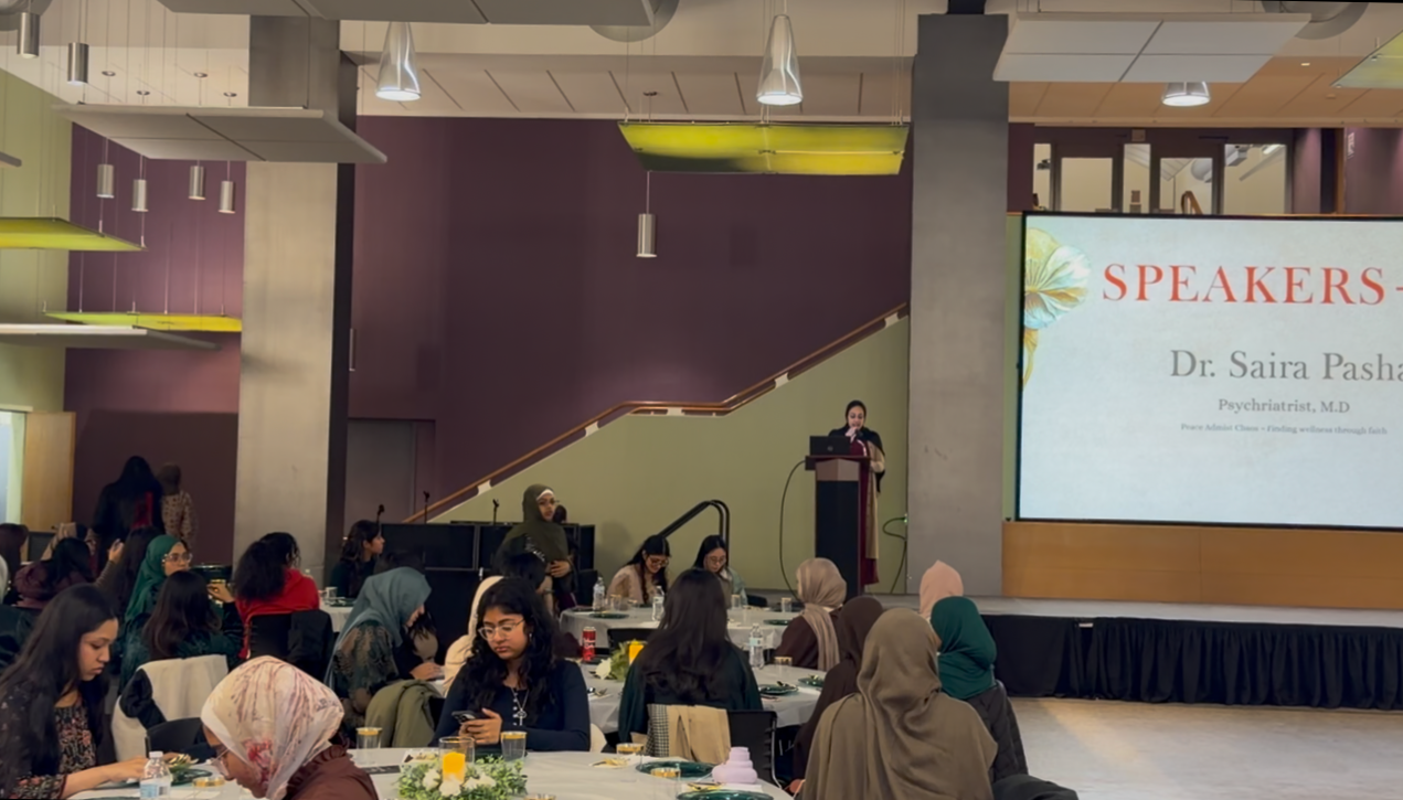 a group of girls and a female speaker 
