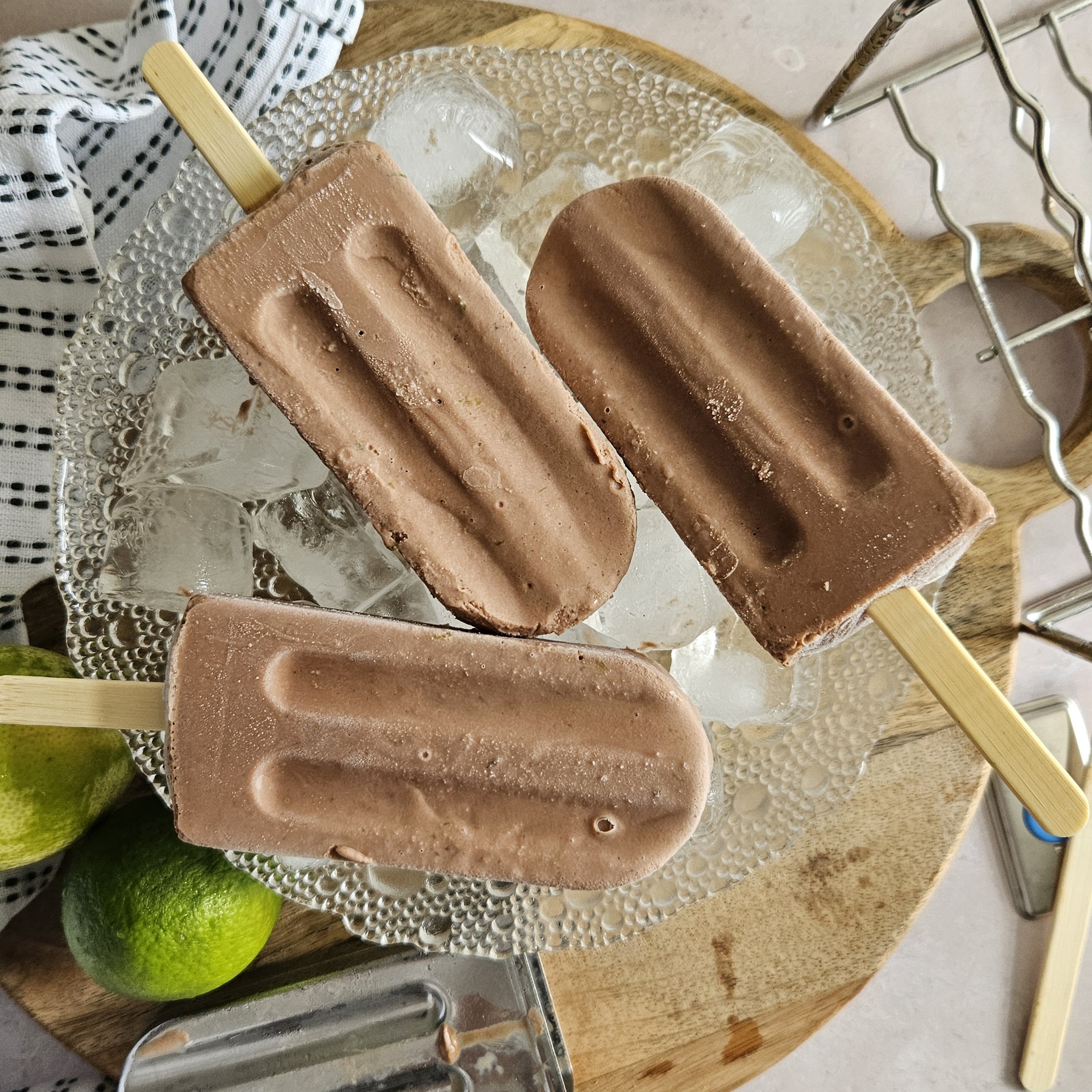 Yoghurt, banana, cacao and lime ice lollies