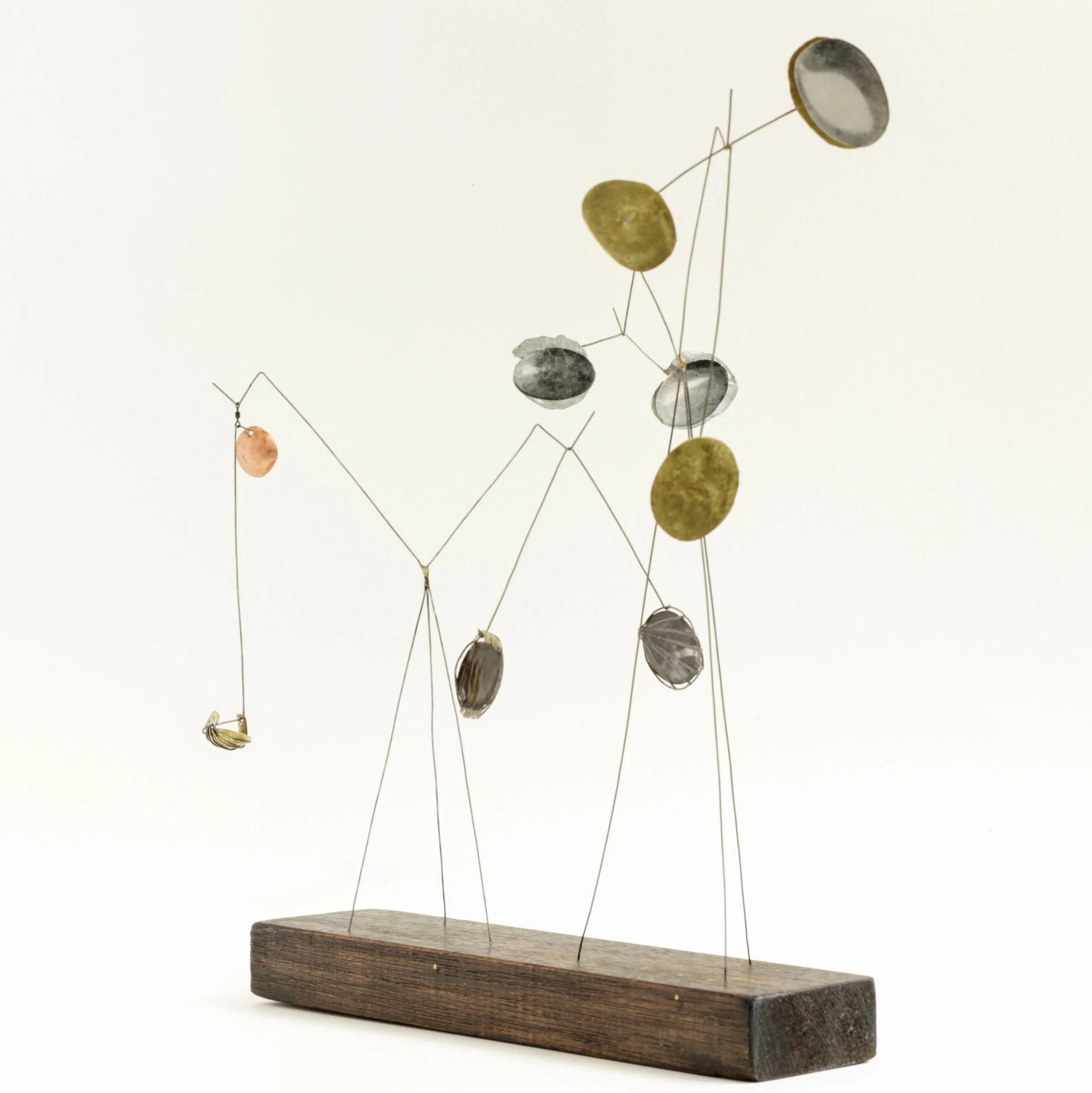 Strange Receiver #2 aluminium, brass copper and silver, vintage wooden toy building block, collaged with images of stones from 1972 Pearls to Pebbles craft book.