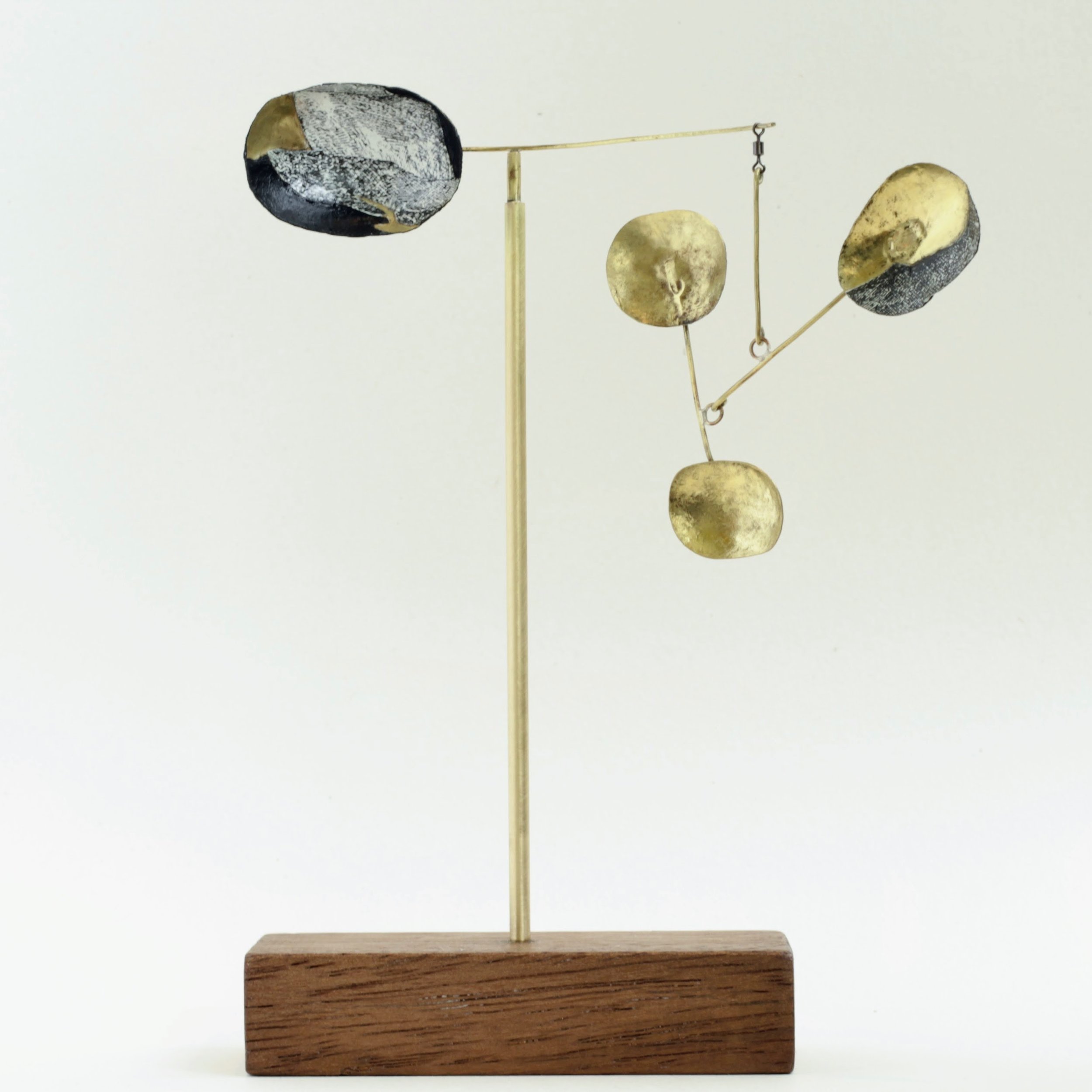 Strange Receiver #1 Brass, fishing swivel, vintage wooden toy building block, collaged from a Pictorial Guide to the Lakeland Fells, shapes moulded around stones from Wimbledon Common.