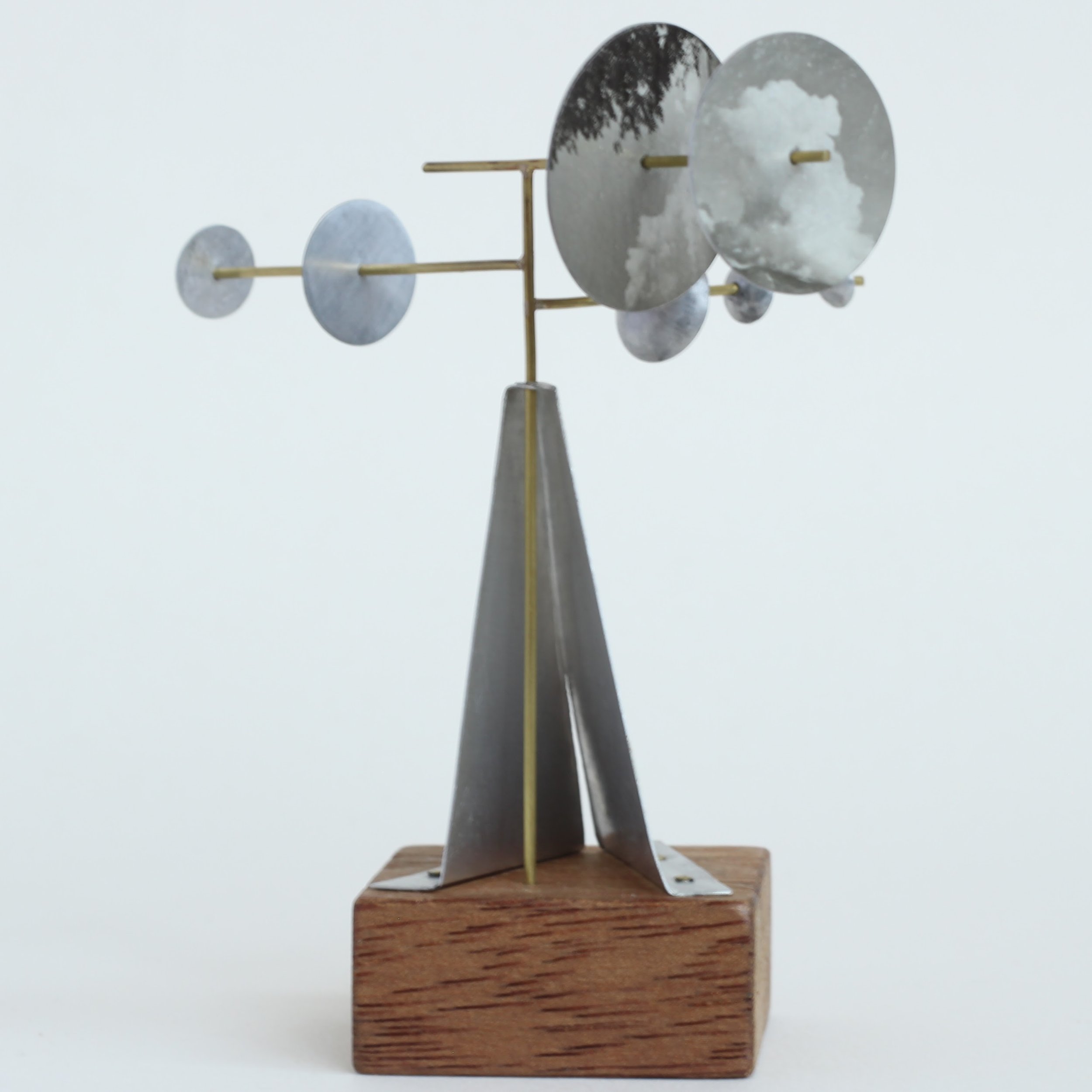 Strange Receiver #8 (2024) aluminium, brass, vintage wooden toy building block, collaged from vintage postcard of mountains and cloudy sky
12x8x8cm