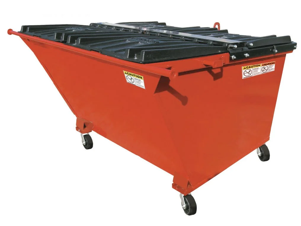 An orange industrial dumpster with a black lid and small wheels.
