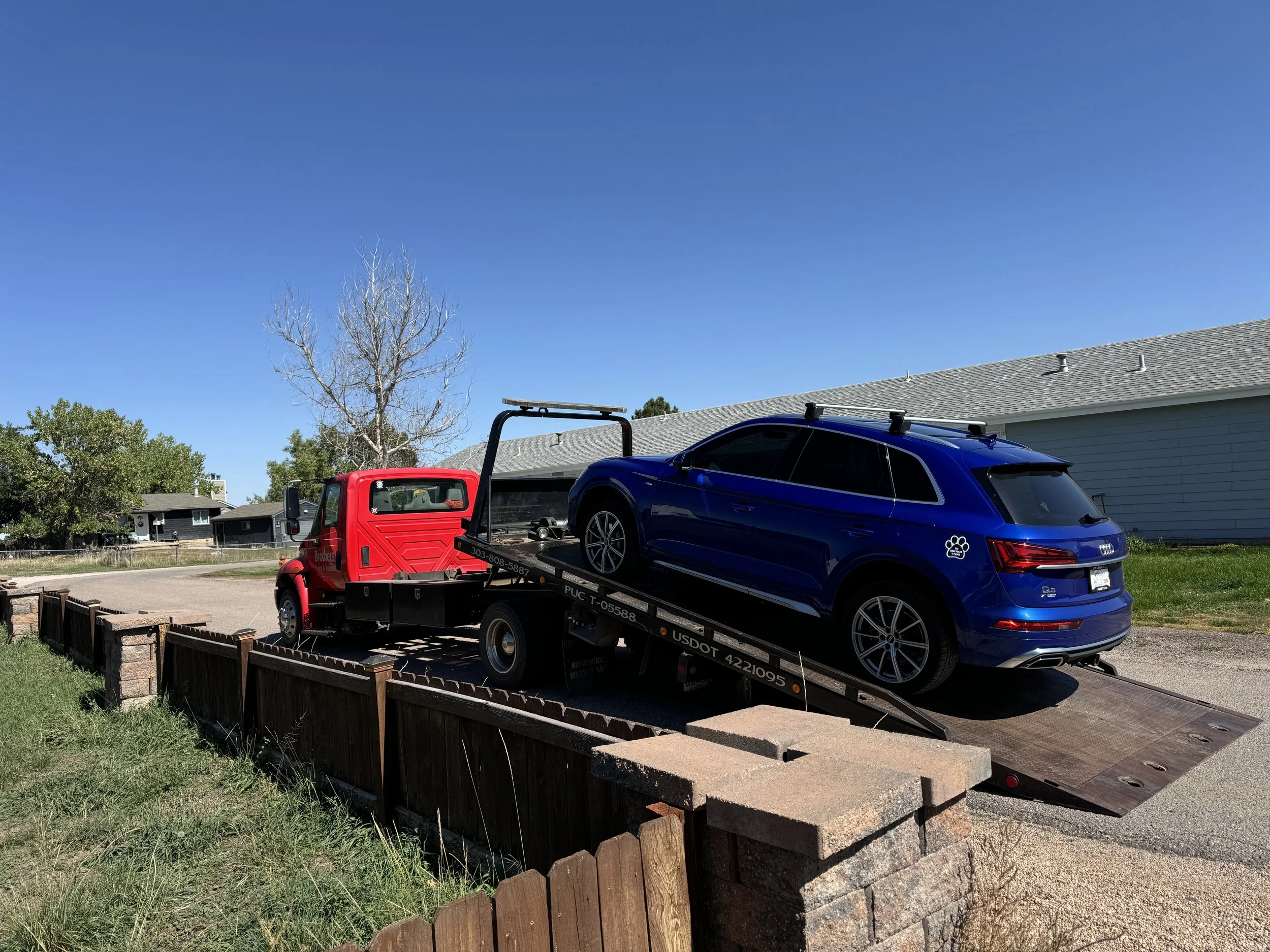 Tow truck in Castle Pine towing European luxury car