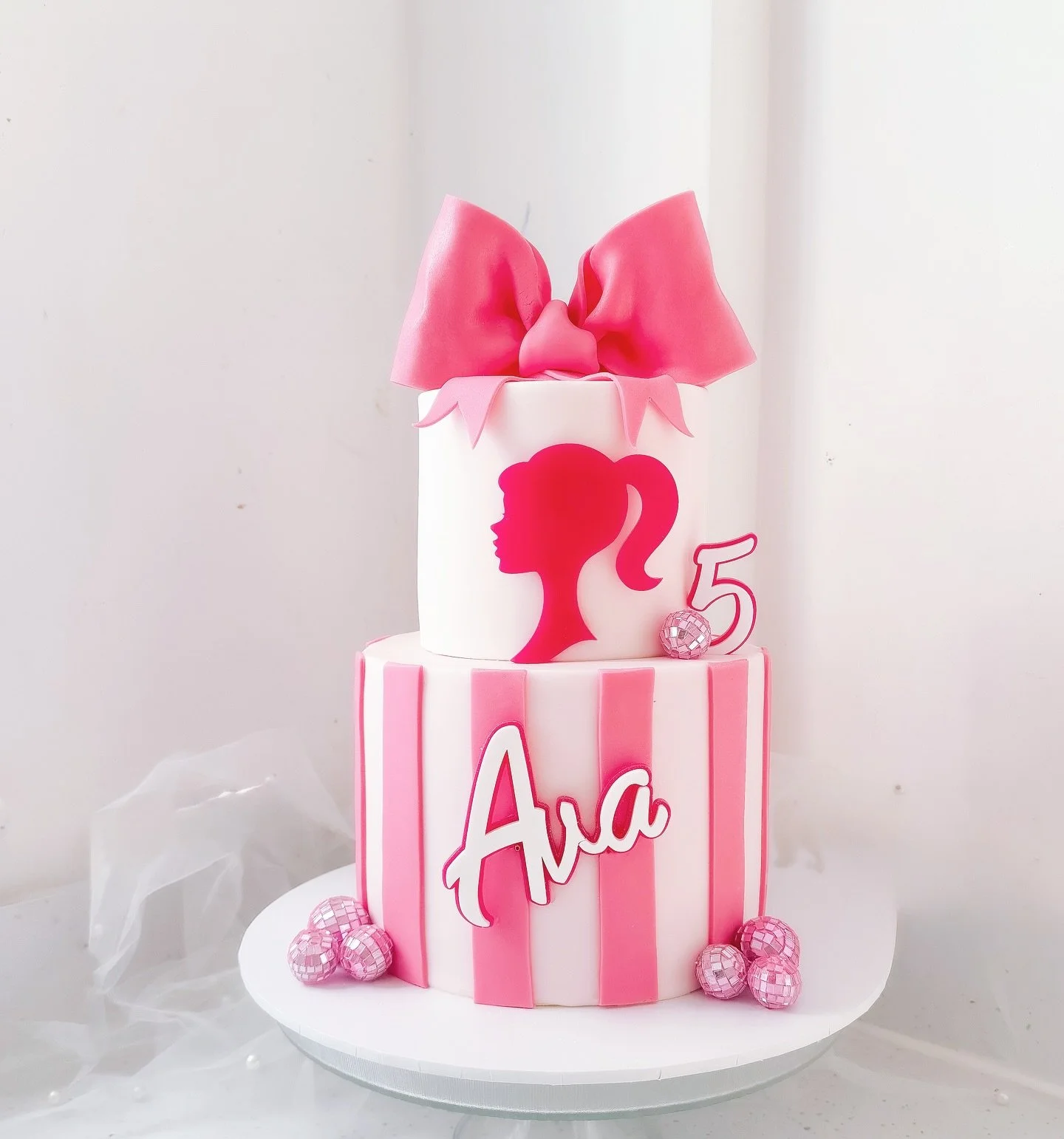 Barbie for Ava&rsquo;s 5th birthday 🎀

I have been waiting patiently for my first Barbie cake and she was worth the wait. I 🩷 her.

🩷 2 tiers of classic chocolate - 7&rdquo; and 5&rdquo;
🩷 All fondant cake
🩷 Fabulous acrylic toppers @3dv_laser 
