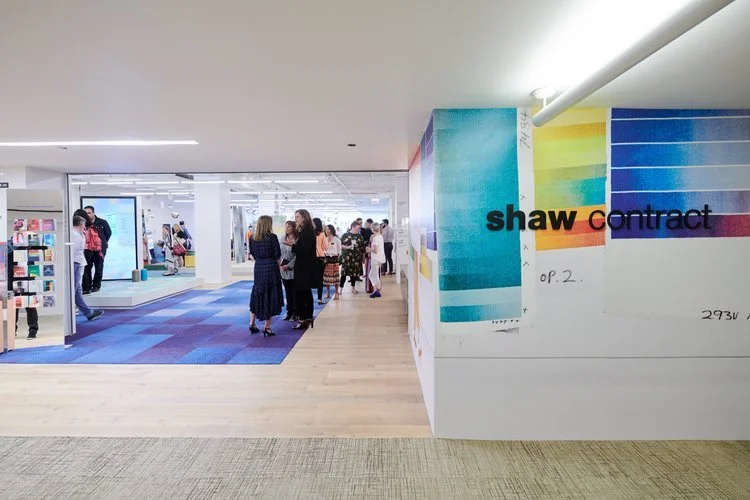 showroom with lots of colorful carpet and wall coverings