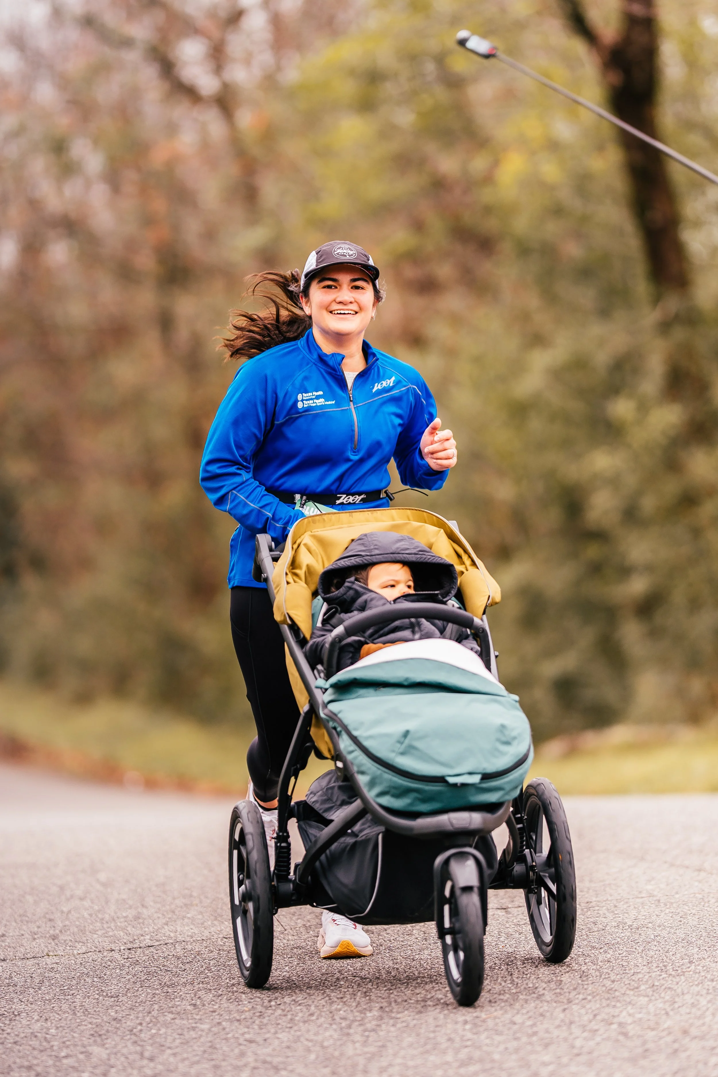 Jen and Kanoa running the Bluff Park 8k 