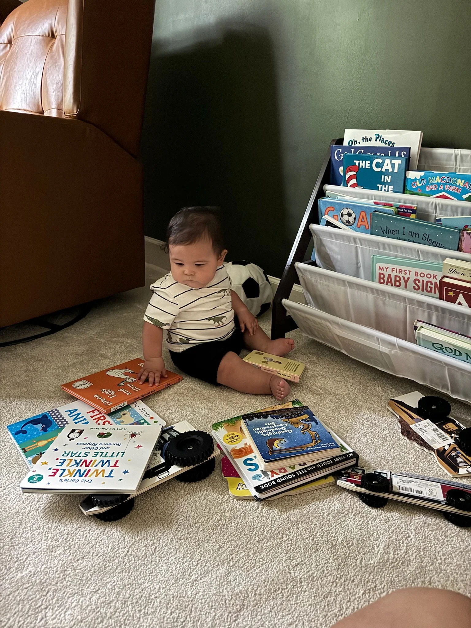Kanoa going through all of his books