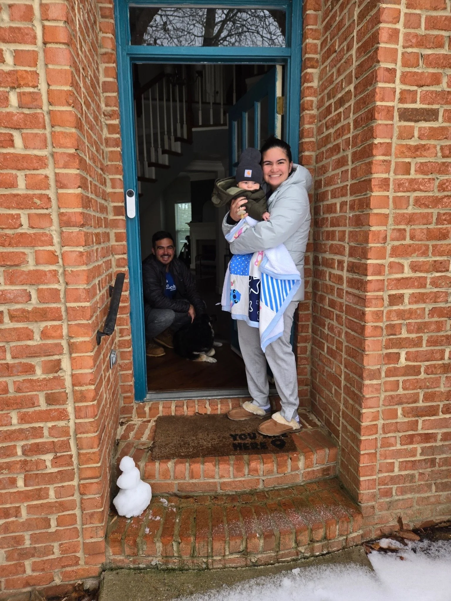Family pic + the snowman our sweet little neighbor friends made for Kanoa
