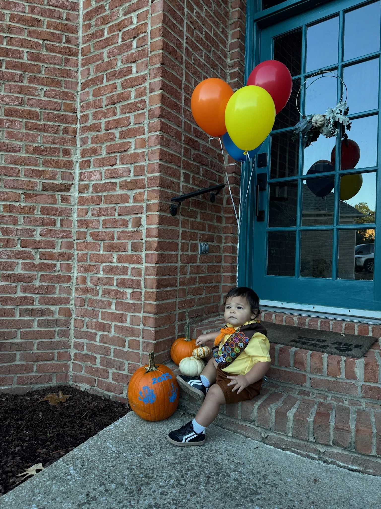 Russell and his pumpkins that we got a the pumpkin patch