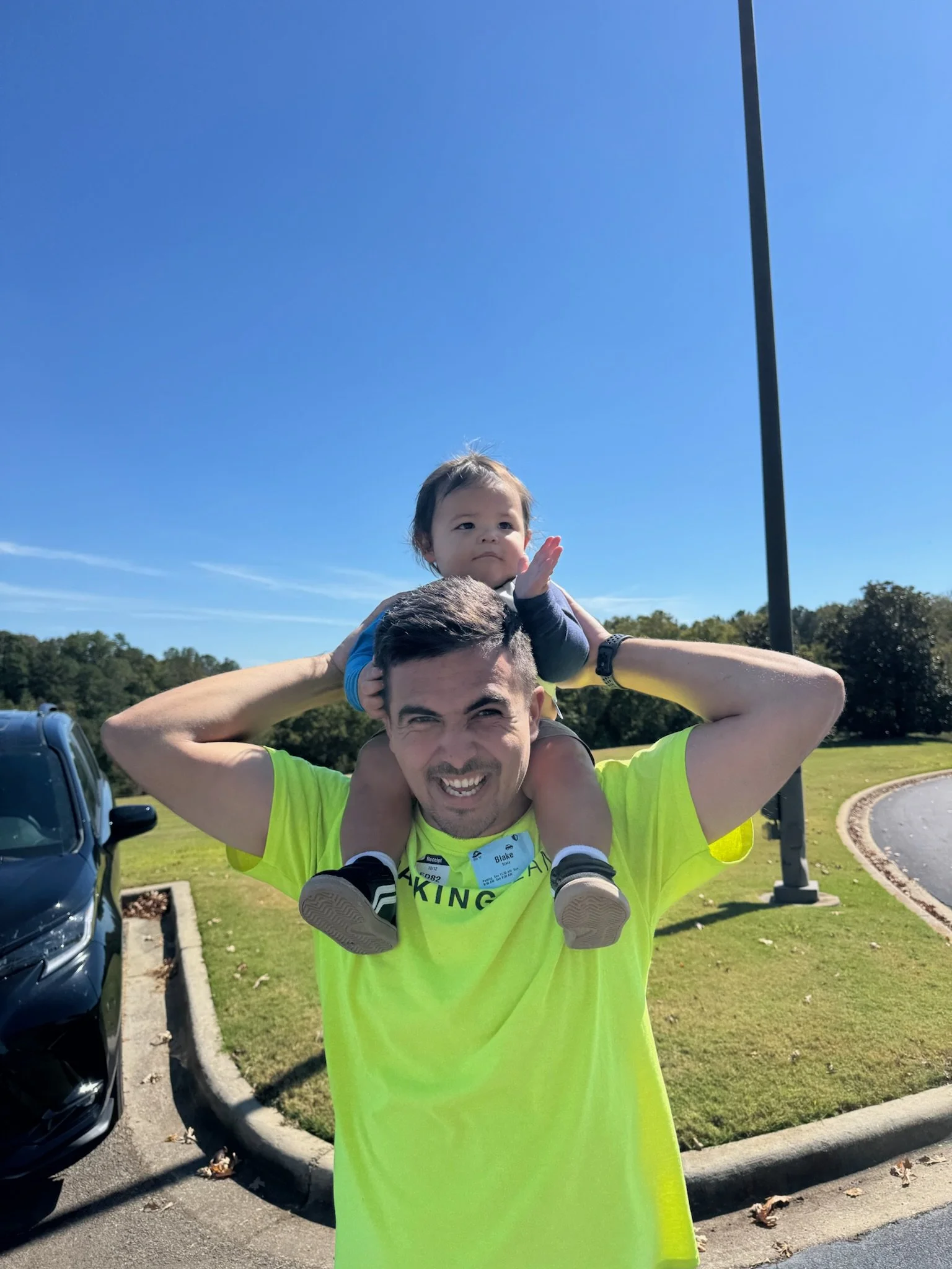 Kanoa practicing his wave to become part of the parking team