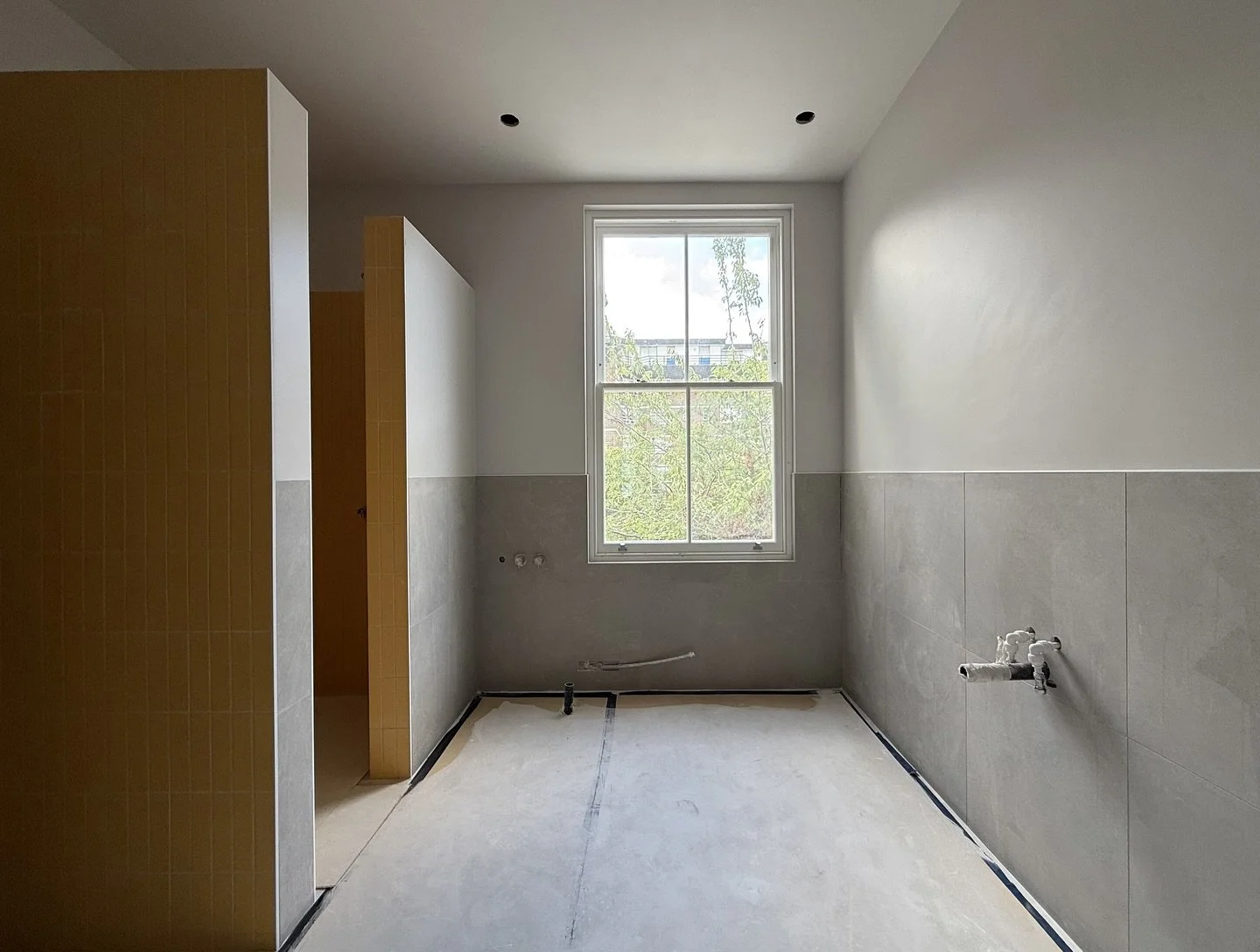 Bathroom progress update: Tiling now complete! The bold yellow tiles create a vibrant focal point within the space.

#bathroomupdate #yellowtiles #boldinteriors #tilingcomplete #interiorprogress #bathroomdesign #strikinginteriors #materialpalette #ba