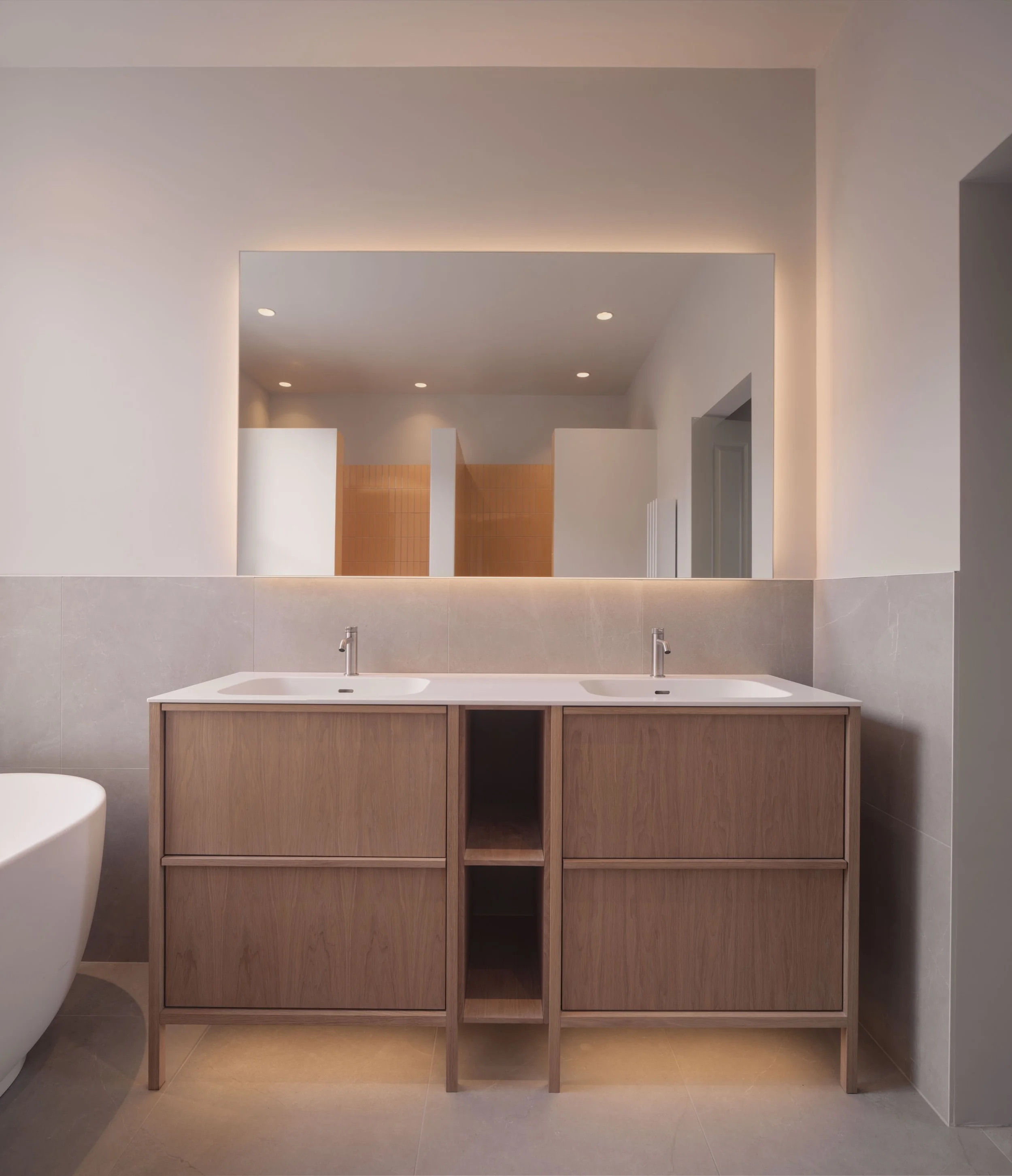 Showcasing the bathroom space in our recently completed project in Clapham, London, featuring striking yellow tiling and bespoke backlit floating mirrors.

#claphamlondon #bathroominspo #interiorarchitecture #lightingdesign #bespokeinteriors