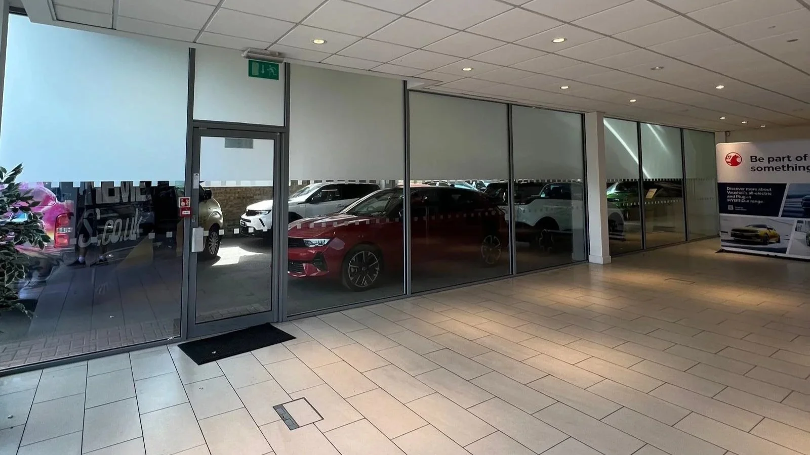 Glass manifestation install by Extreme Signs