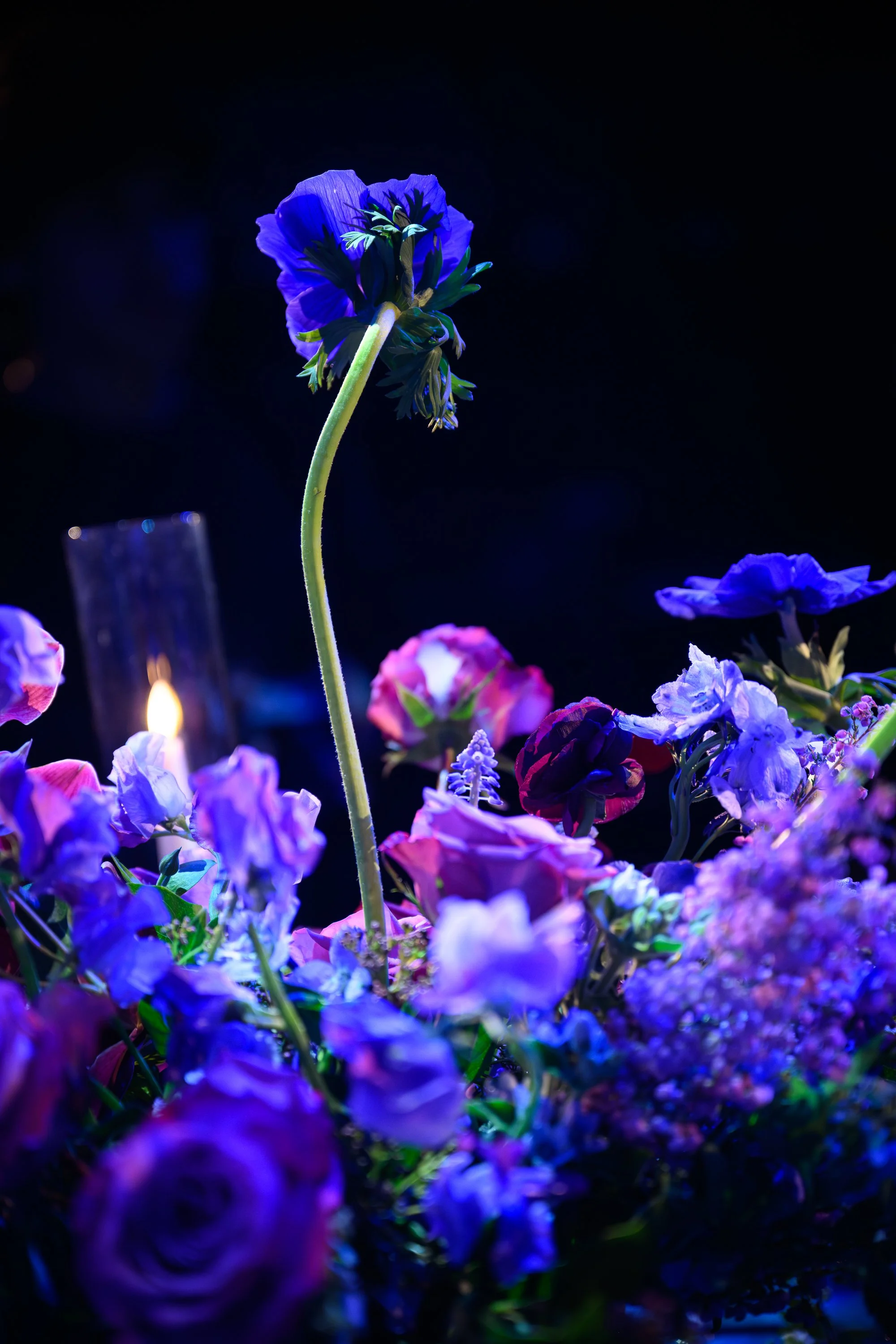Moody Purple Wedding Floral Arrangement with Candlelight