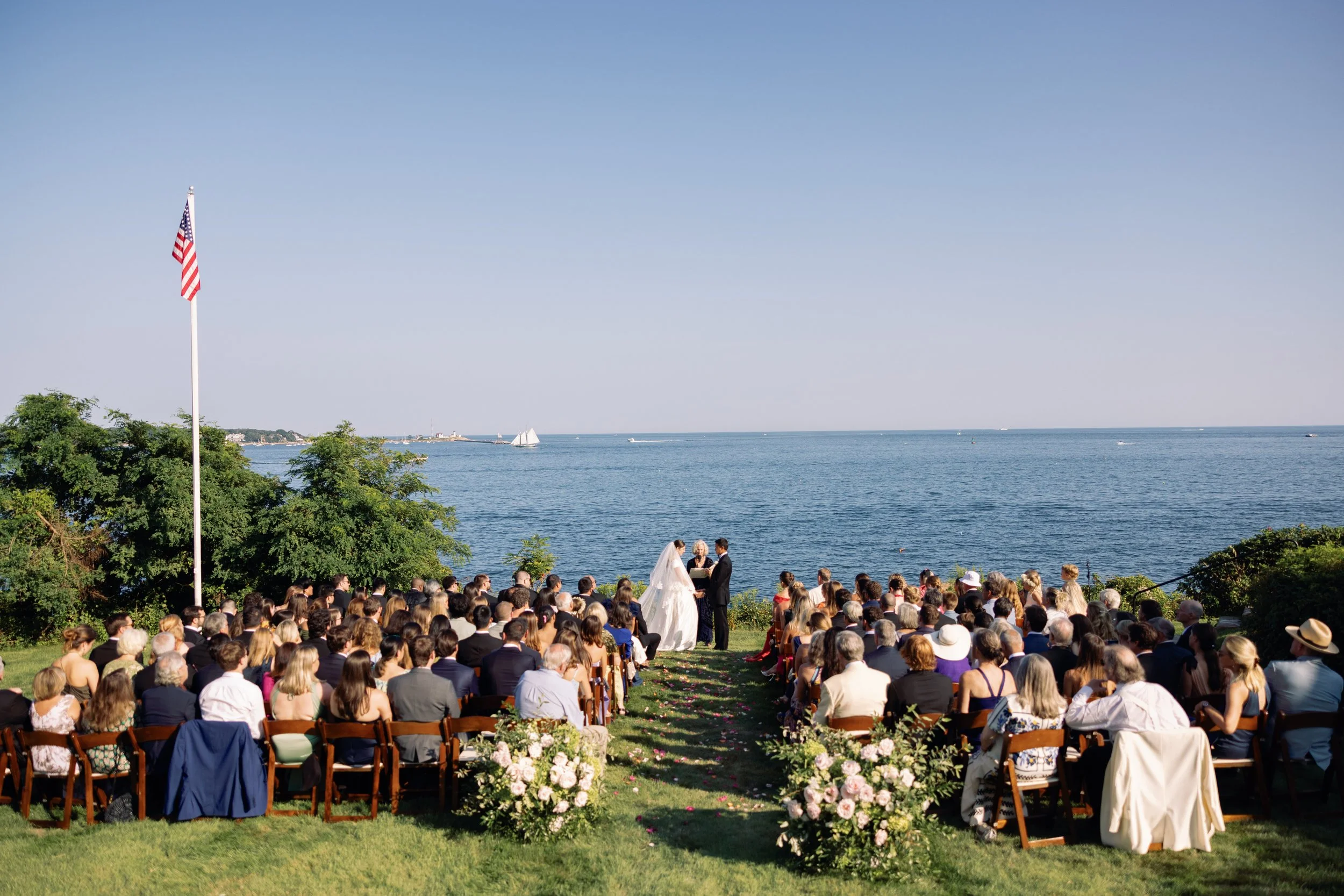 Waterfront New England wedding ceremony planned and designed by Marissa Pedone Events