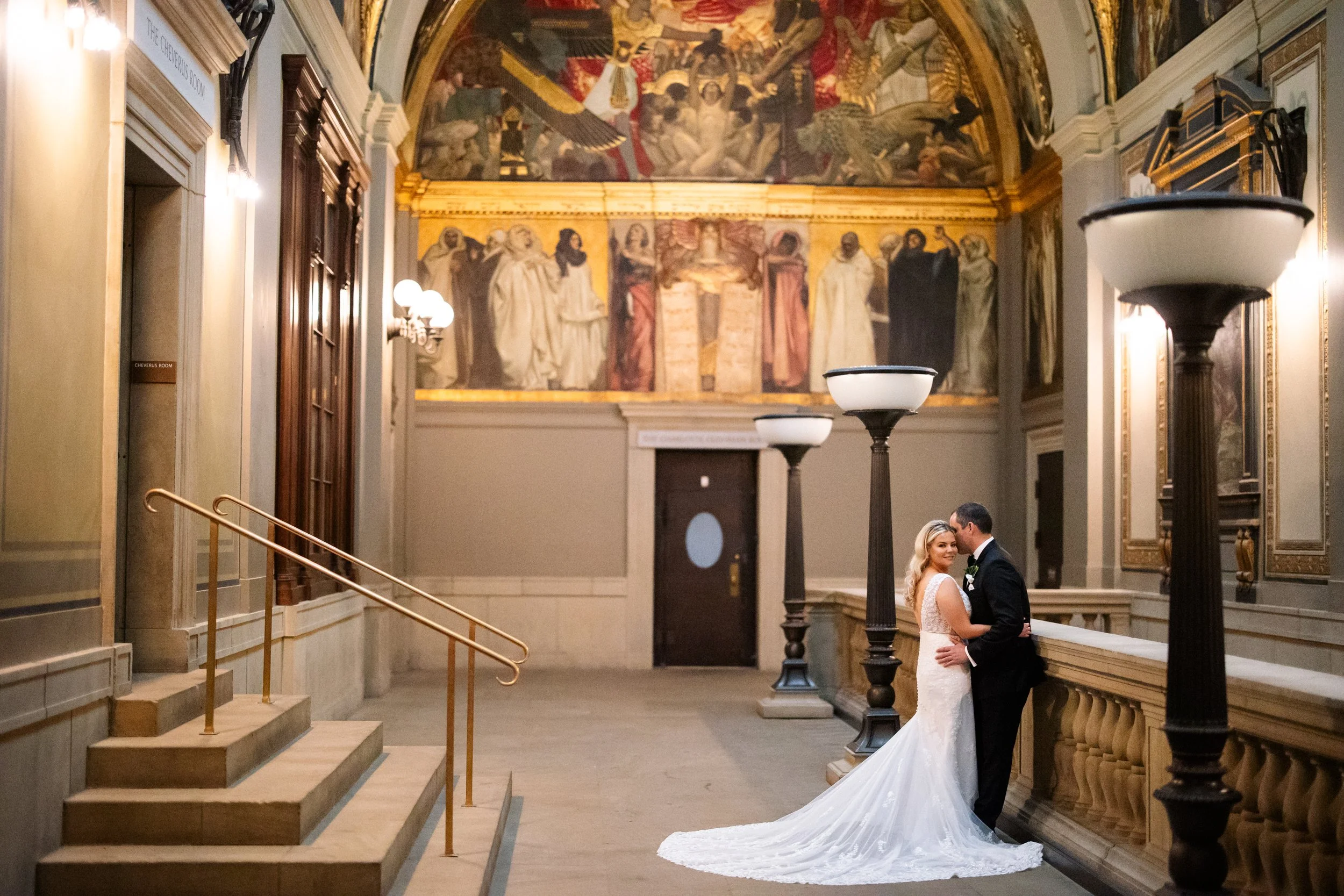 Bride and groom in Sargent Gallery at Boston Library