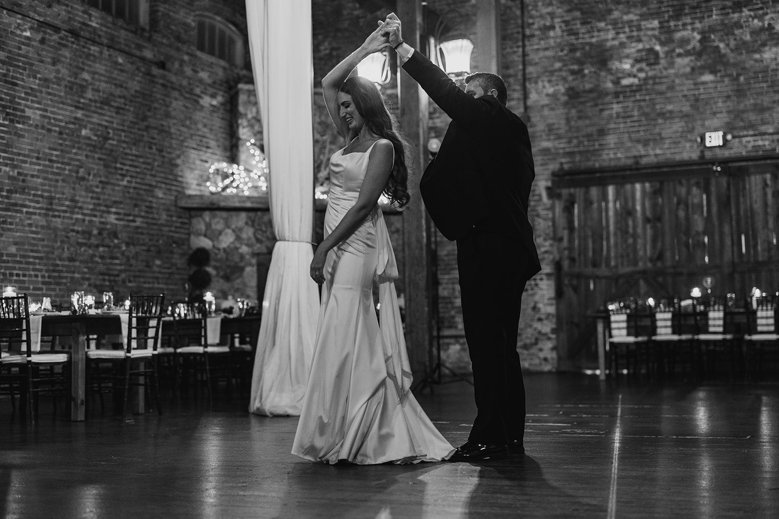 Bride and groom dancing together at their New Hampshire wedding venue.