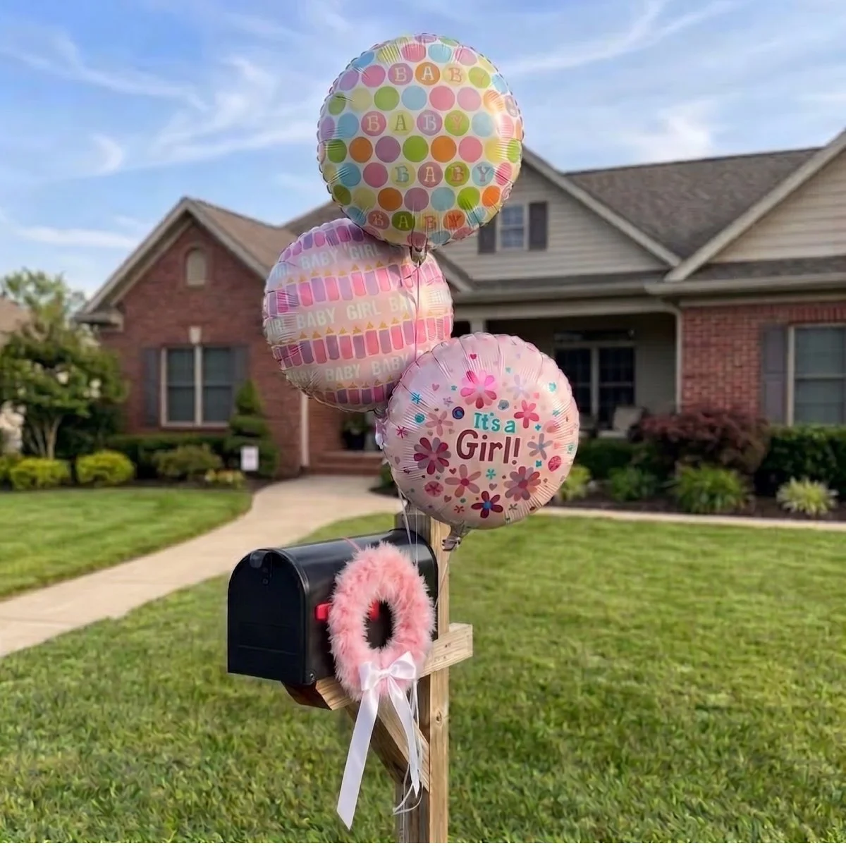 baby girl wreath and balloons.jpg