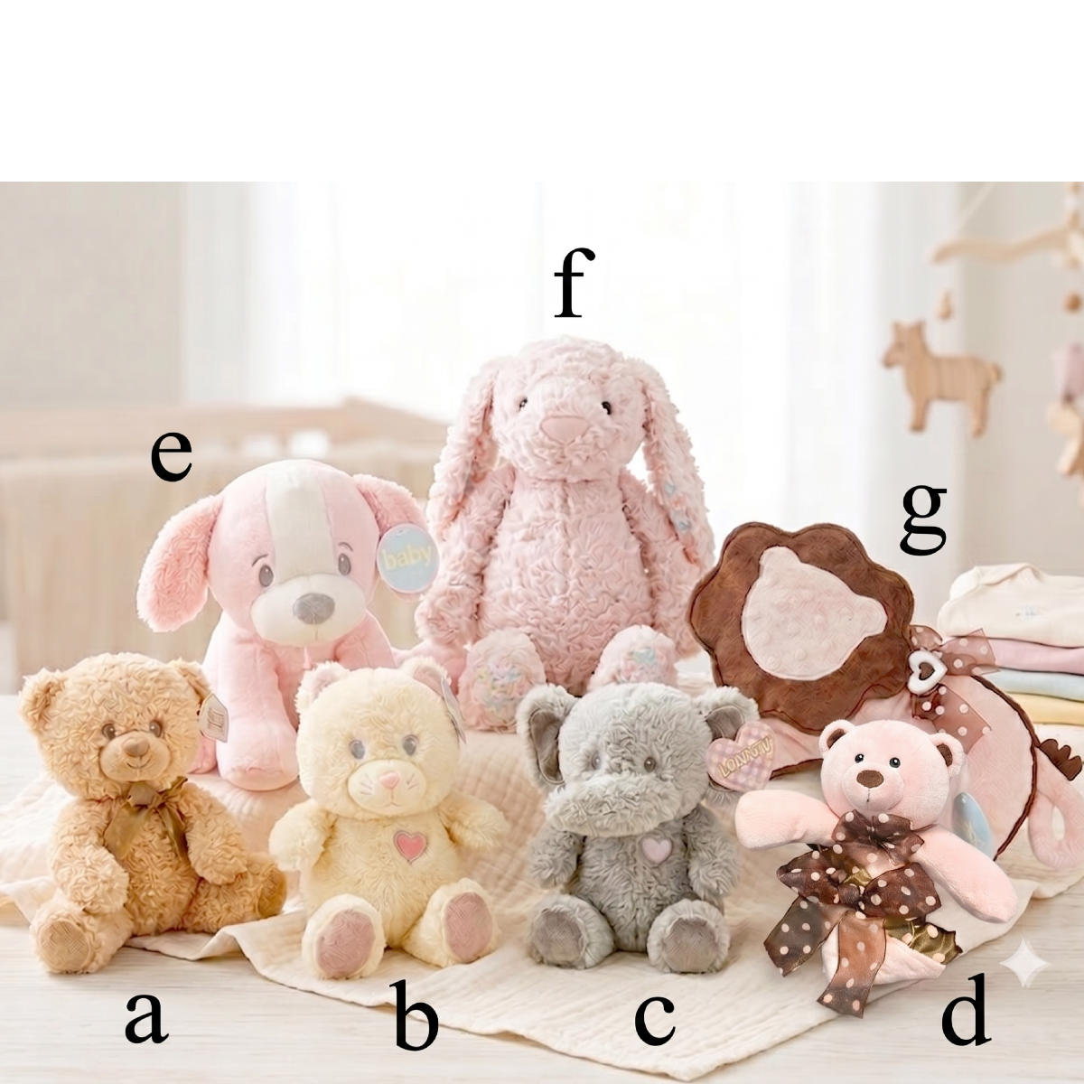 baby girl plush animals with labels.png