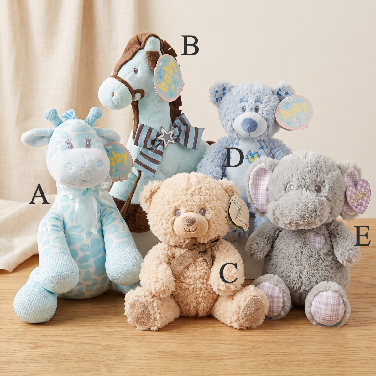 baby boy plush animals with labels.png