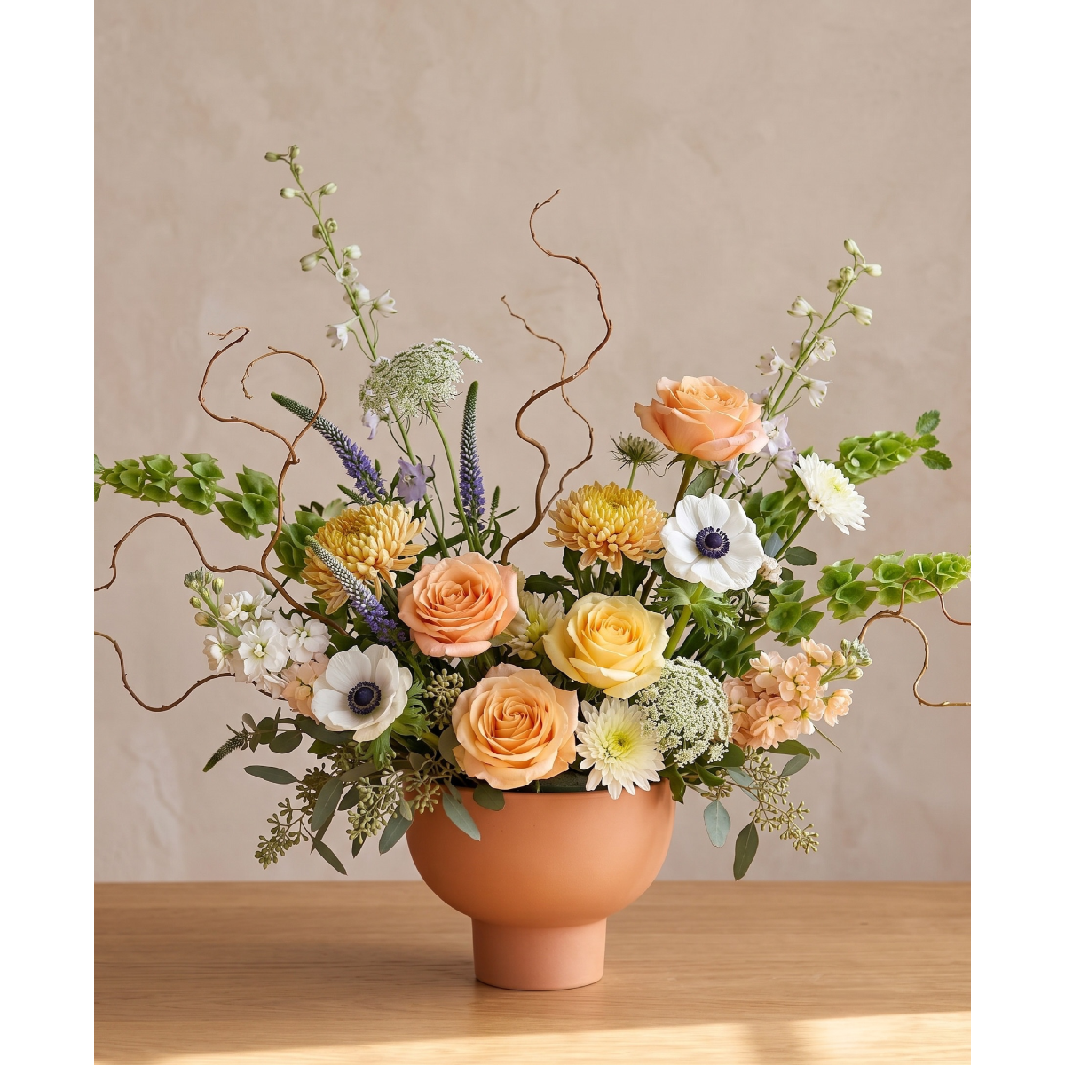Terra cotta whispy arrangement.png