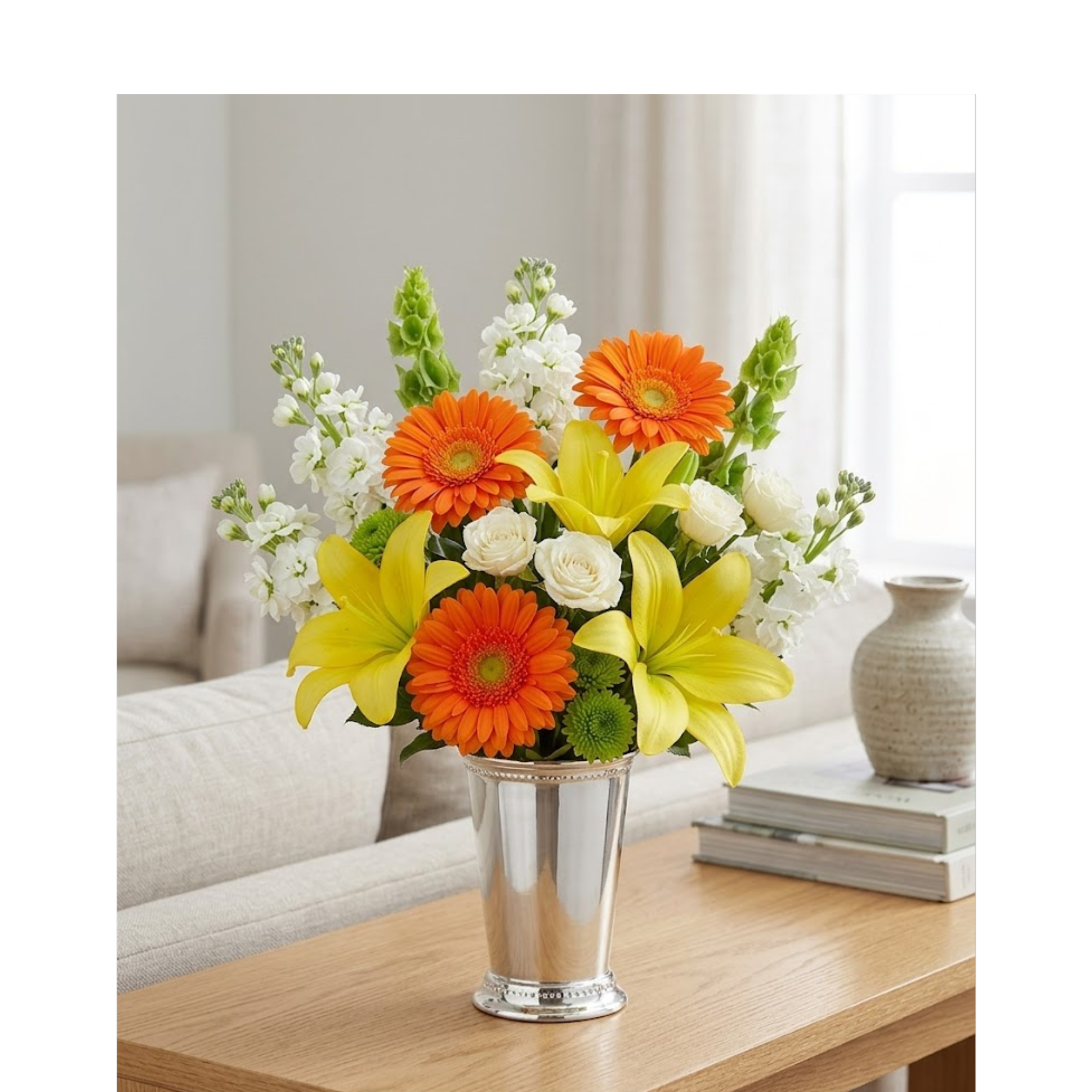 citrus tones flowers in mint julep vase.png