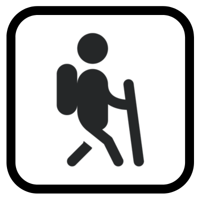 icon of a hiker with a backpack  holding a walking stick.