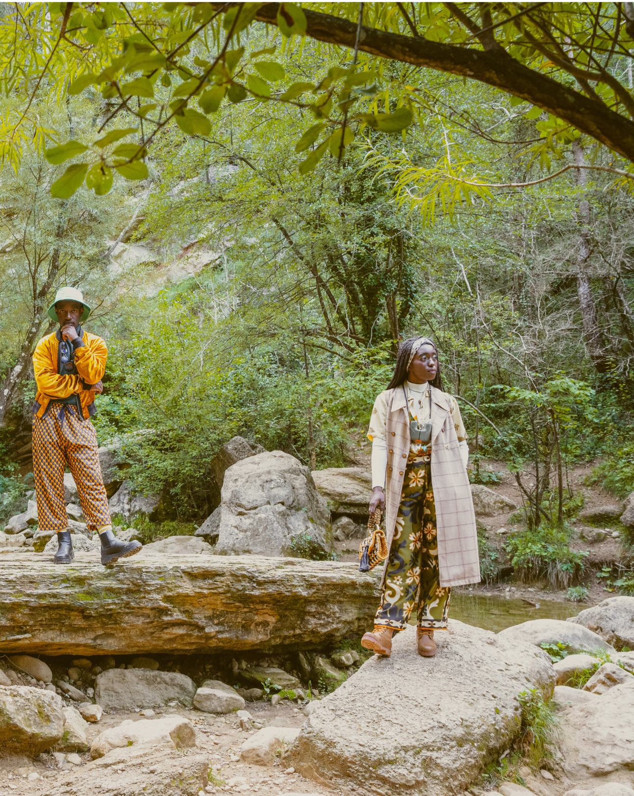 Two People Outside posing on top of rocky terrain