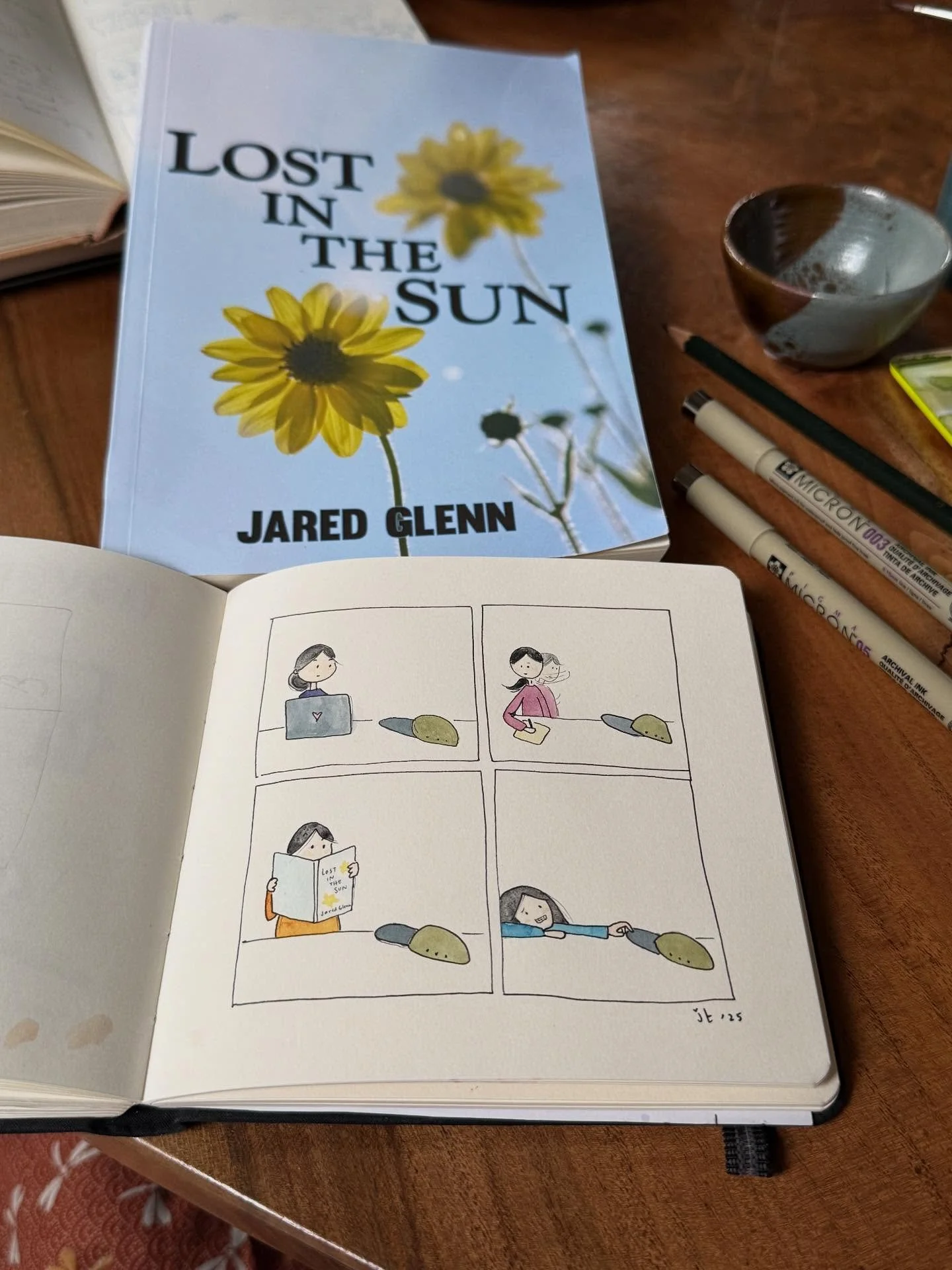 Behind the Scenes of Part 4 Writing Life
-
The update to this comic series from the time I drafted this comic last year to when I finally made it last month&hellip; is swapping out Jared&rsquo;s first book (Left Unsaid) with the cover of his second b