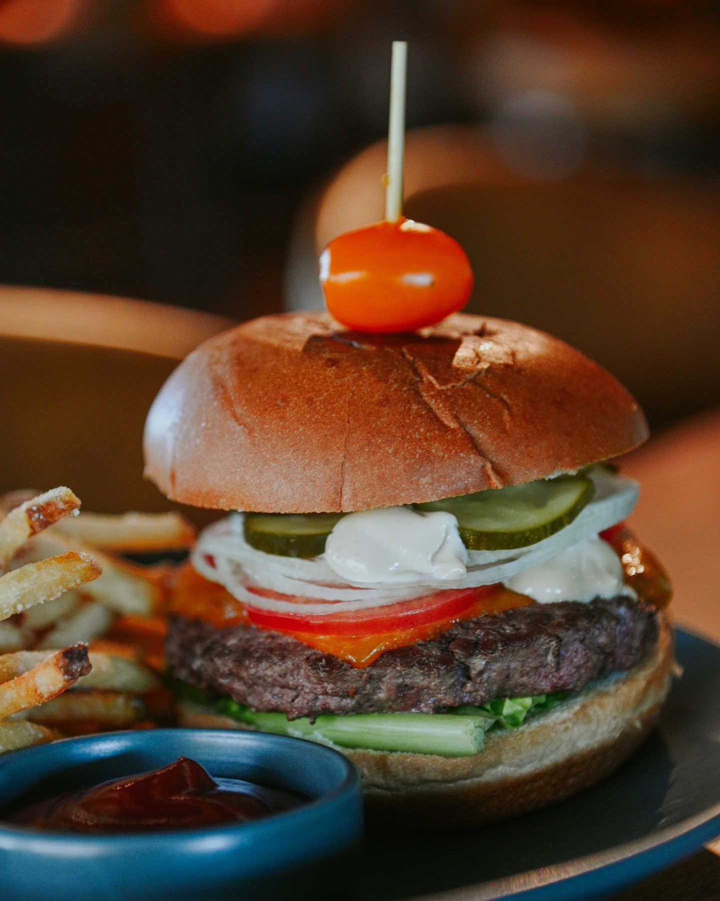 Juicy, stacked, and full of flavor&mdash;our Bistro Burger is a house favorite for a reason. Topped with melty cheese, crisp greens, and bold flavor in every bite. 🍔⠀
⠀
📖 Check out the full menu | 📅 Book your table: Link in Bio⠀
⠀
#22fifteen #Bist