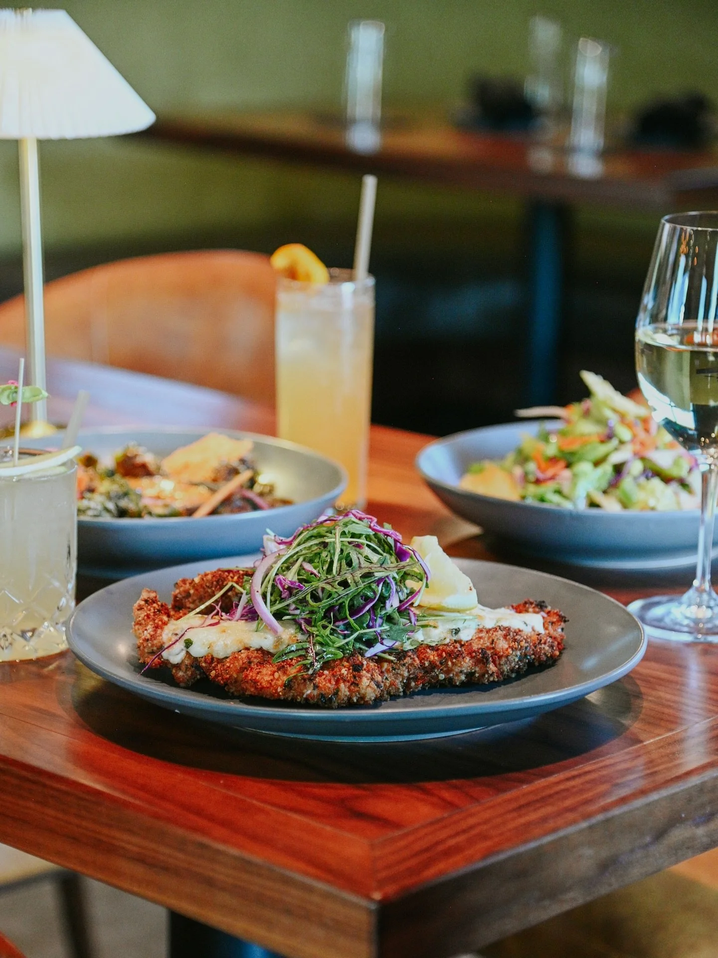 Chicken Milanese &bull; Parmesan crust, simple salad, brown butter, caper lemon vinaigrette. ✨

Enjoy a sneak peek of our new menu items at 22fifteen.