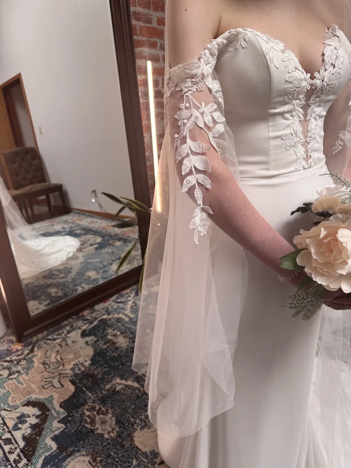 Elegant off-shoulder sleeve extensions we had the opportunity to build.