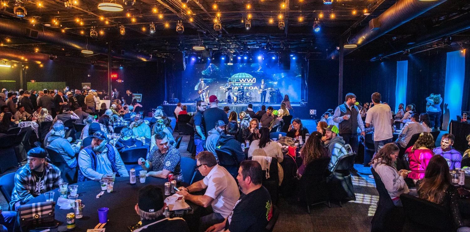 Live stage and full house inside The Industrial's indoor exhibit hall