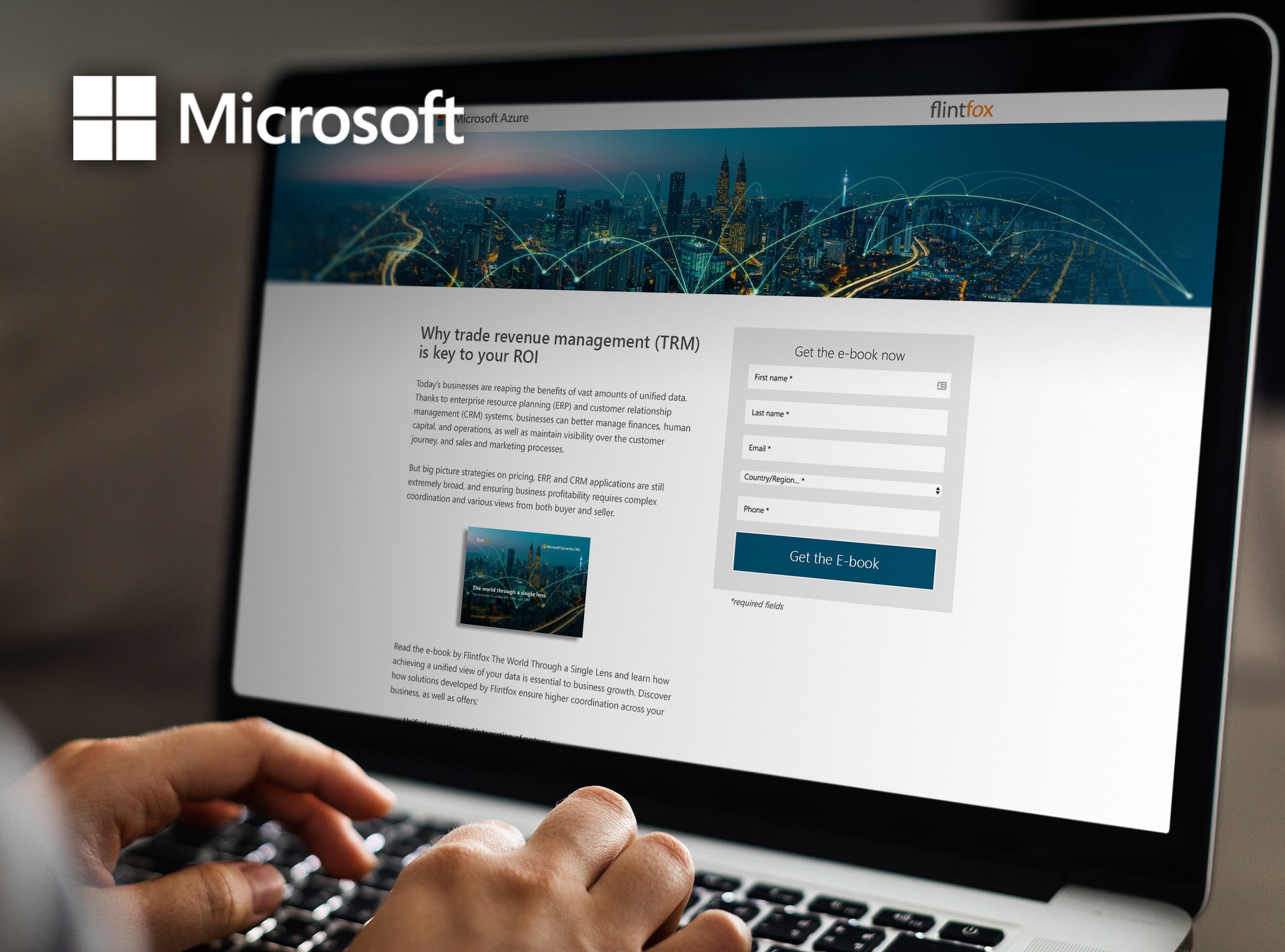 Person using laptop to view a webpage about trade revenue management and a free e-book offer.