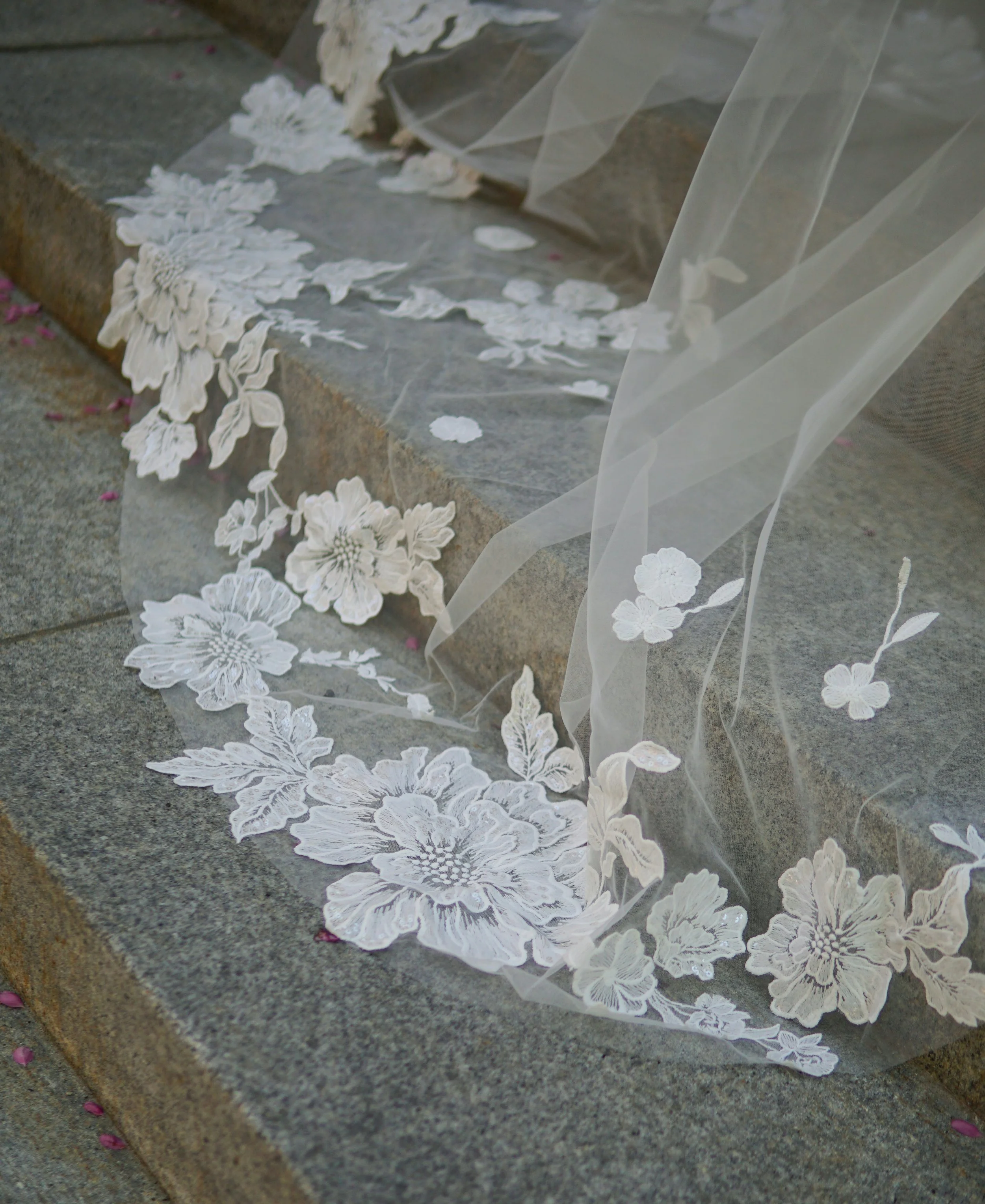 Close picture of the floral lace on the veil