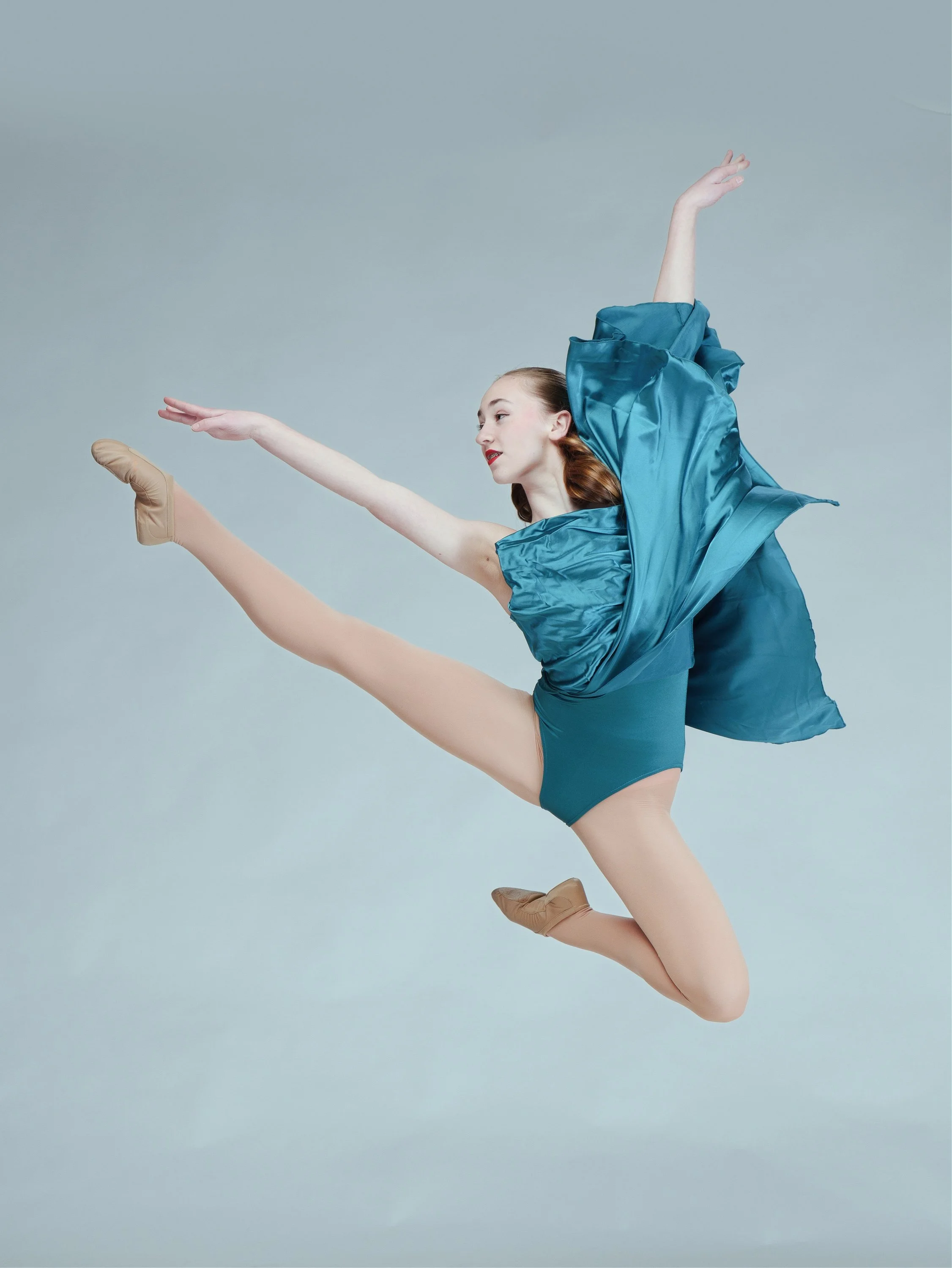 High-speed motion freeze studio lighting for fine art dance portraits, ballet academies, and competition teams in the Pacific Northwest