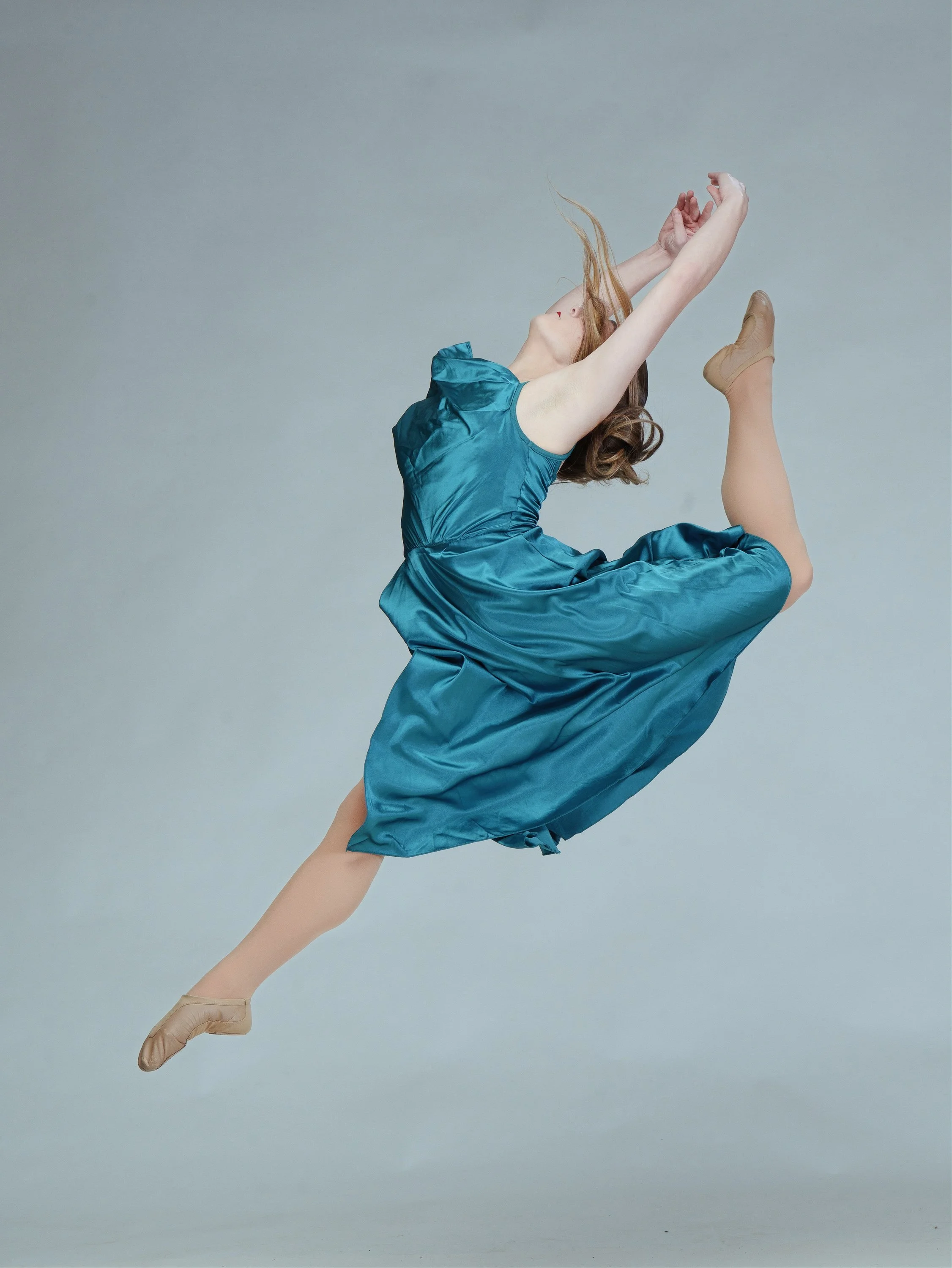 Commercial studio lighting and dramatic media day portraits for dance schools, cheer squads, and gymnastics studios by Justin Grafton Studios