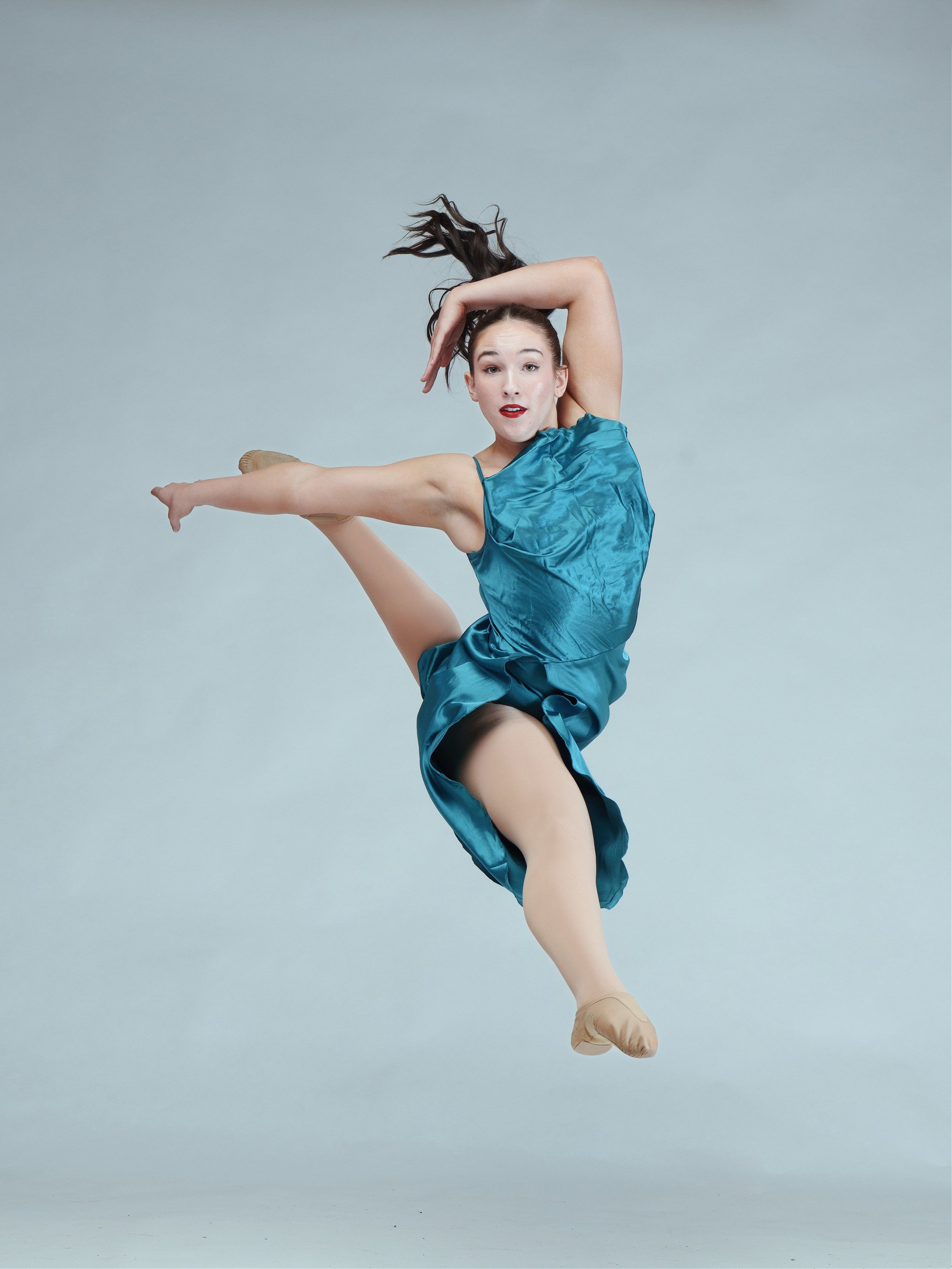 High-speed motion freeze studio lighting for fine art dance portraits, ballet academies, and competition teams in the Pacific Northwest