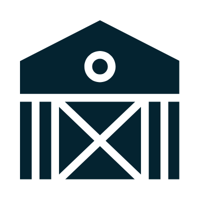 Simple illustration of a barn with a circular window and large double doors. Drone Detection Ireland