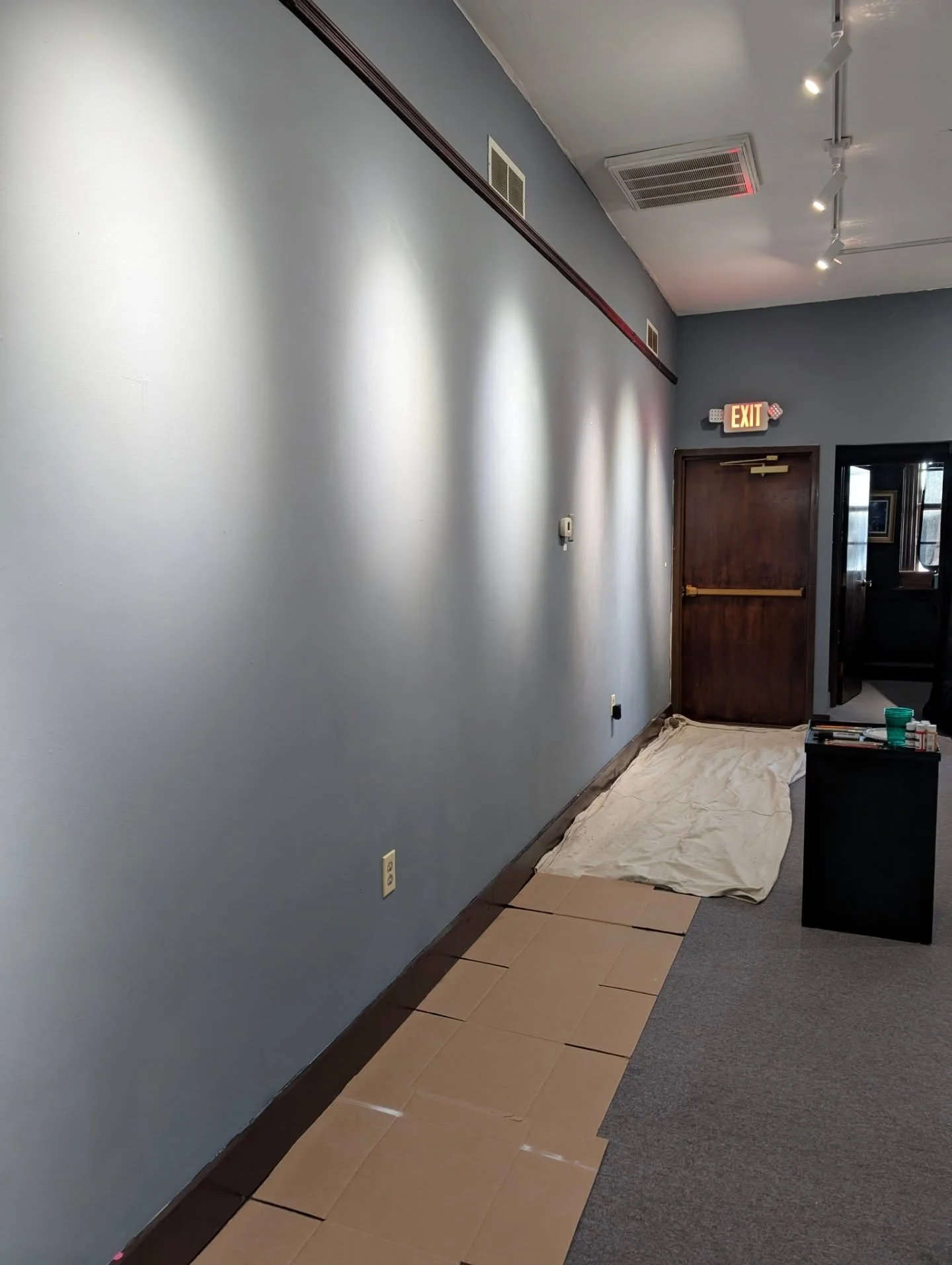 These walls are clean! ...and ready for you to decorate with your art for Graffiti Night. Tonight from 6-8 pm. 
Paint, pencil, charcoal, marker, paper mache...whatever you want to use to create your wall art. Use ours or bring your own. $10 cover. Al