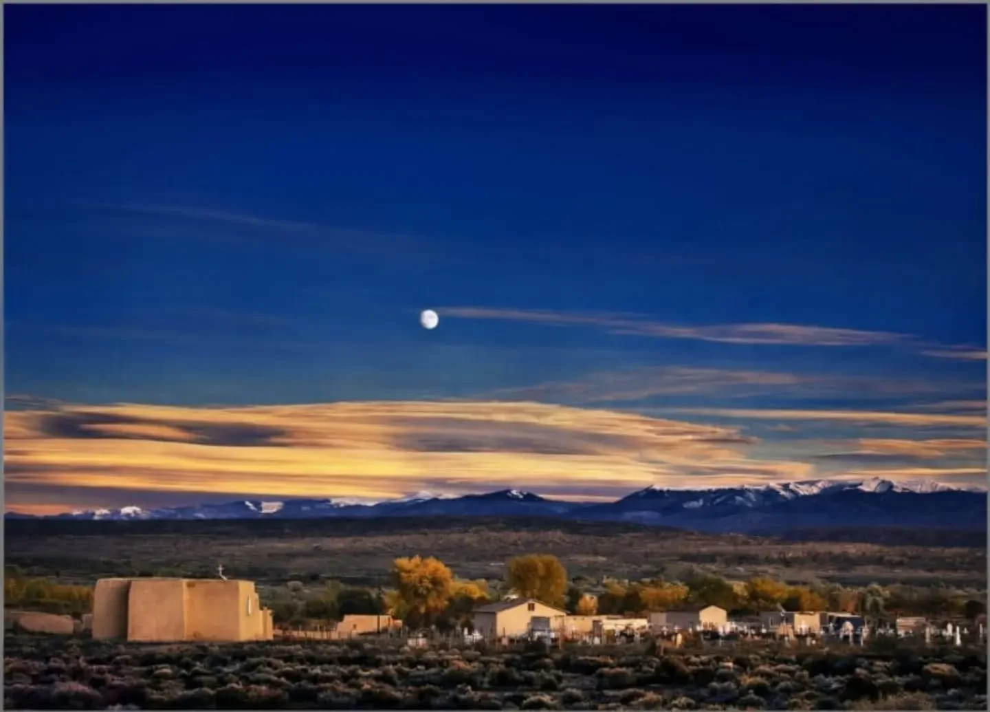 A NYC gallery has created much controversy recently by putting up for sale this image, originally entitled "Moonrise", and created by Ansel Adams, but regenerated as colorized by an AI program directed by a prompt from the gallery owner. Th