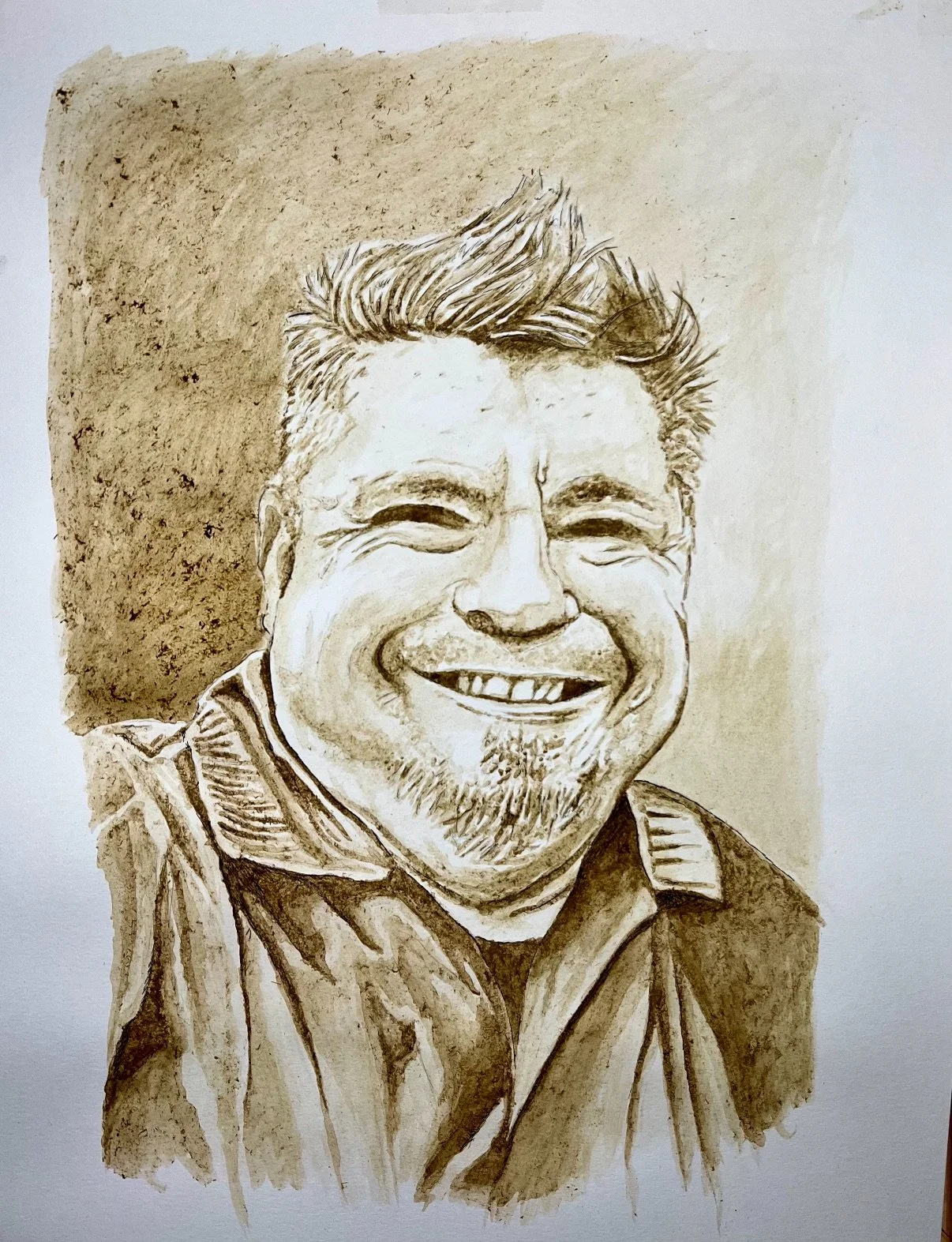 A sepia-toned portrait drawing of a smiling man with short, styled hair and a beard, wearing a jacket.