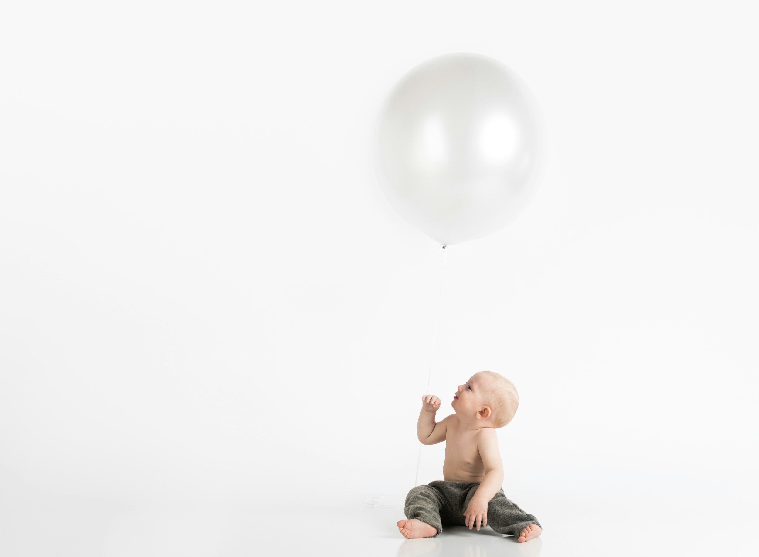 Minimal studio setting showing baby session focused on calm and efficient baby passport photography in Richmond