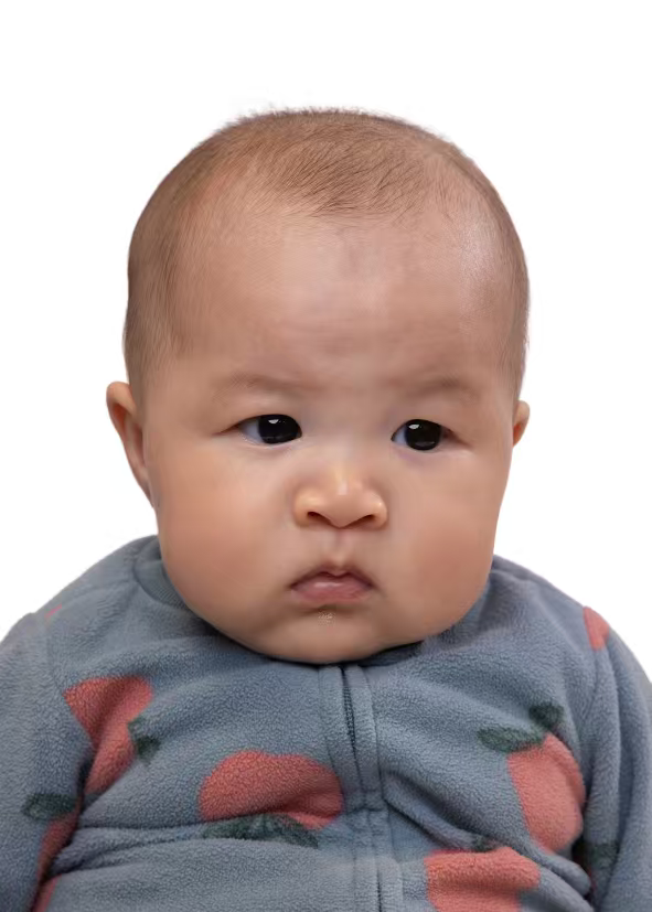 Baby passport photo style example on white background showing head centered and neutral expression for Canada passport photo guidelines